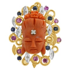 14 Karat Yellow Gold Ruby, Sapphire, Diamond, and Carved Coral Buddha Ring