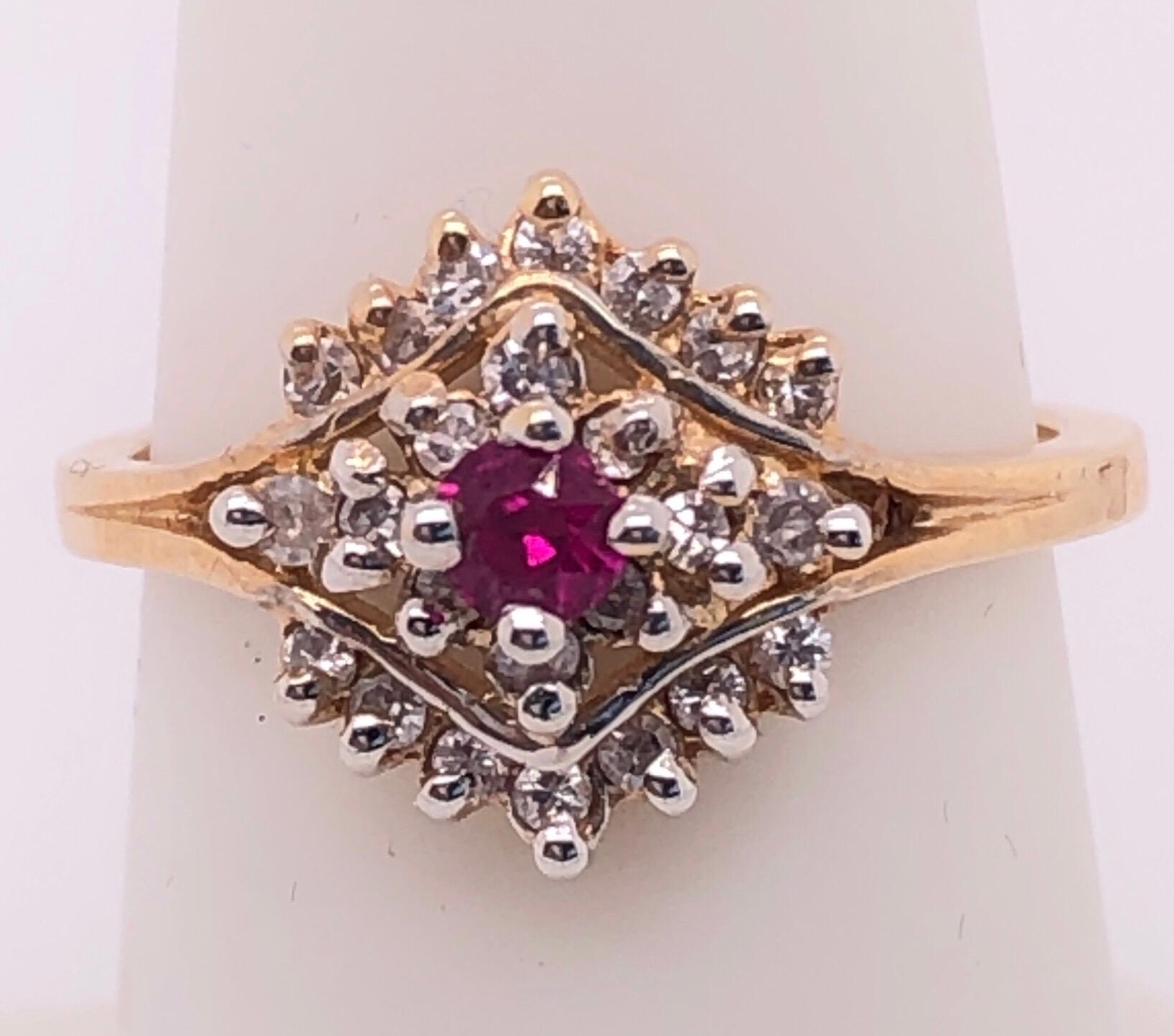14 Karat Yellow Gold Ruby Solitaire with Diamond Cluster Ring In Good Condition In Stamford, CT