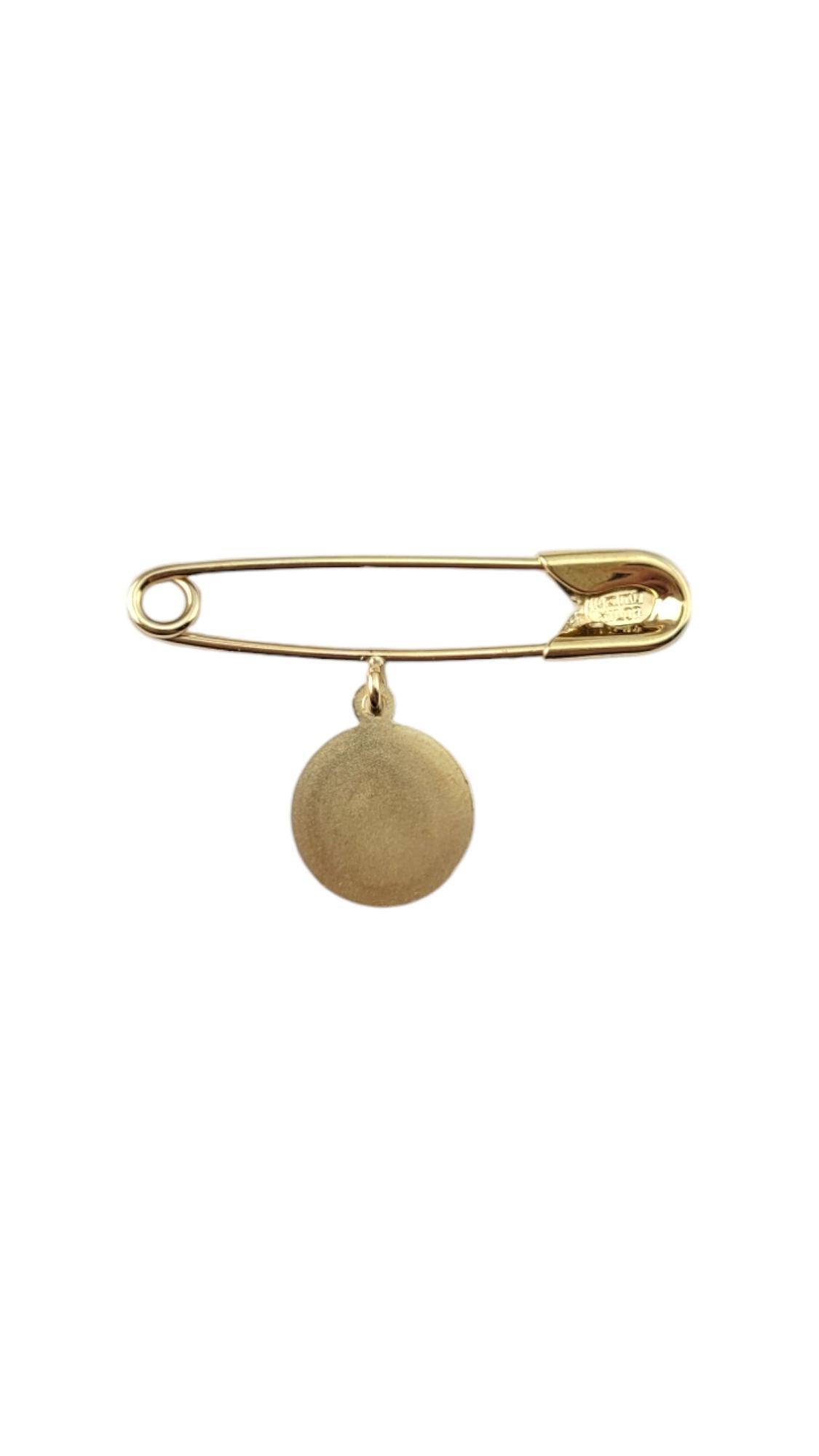 14K Yellow Gold Safety Pin w/ Angel Charm-

This 14K yellow gold safety pin with angel charm features a delicate design, symbolizing protection and guidance. Crafted with precision, it combines elegance and meaning, making it a timeless addition to