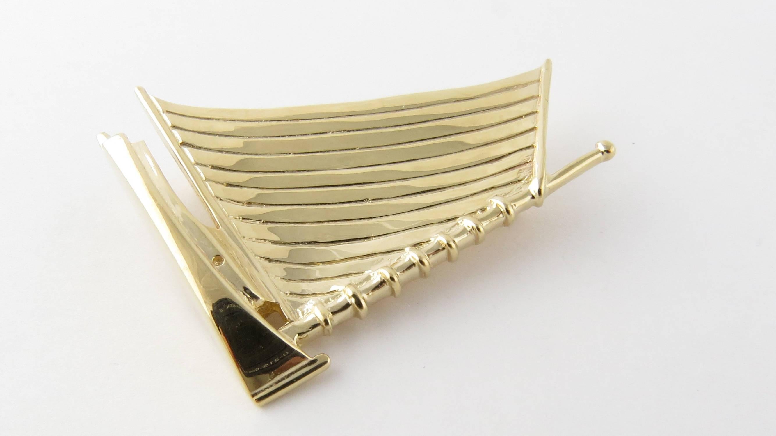 Vintage 14 Karat Yellow Gold Sailboat Pin/Brooch

This stunning 3D brooch features a exquisitely crafted sailboat in meticulously detailed 14K gold. Back of brooch reads 