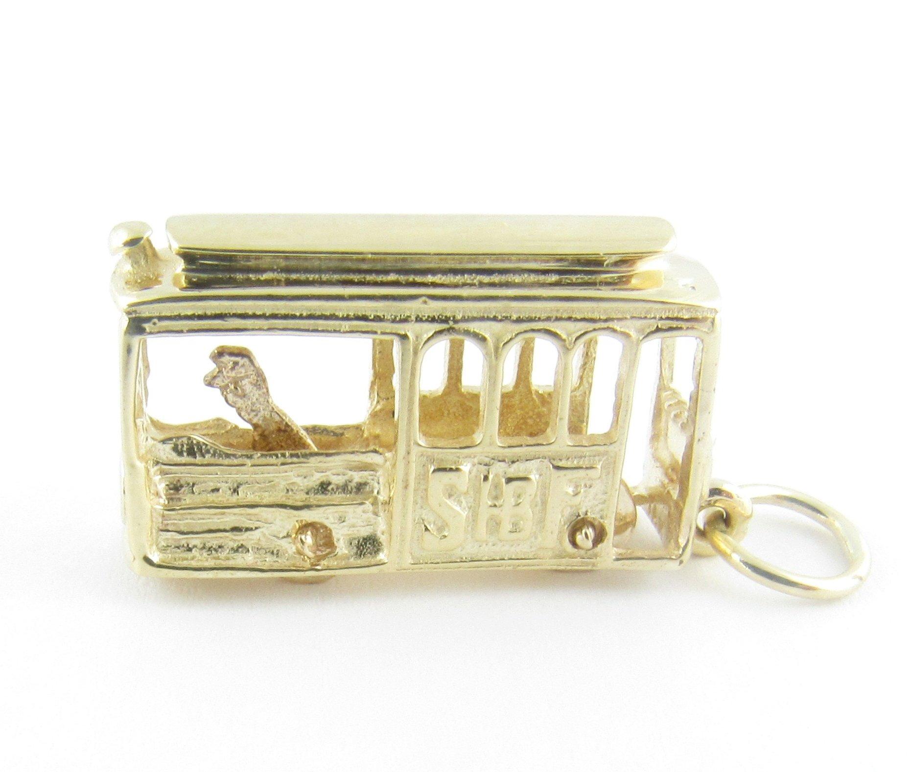 Vintage 14 Karat Yellow Gold San Francisco Cable Car Charm

Jomp on the trolley!

This whimsical charm features a miniatures cable car with the words 