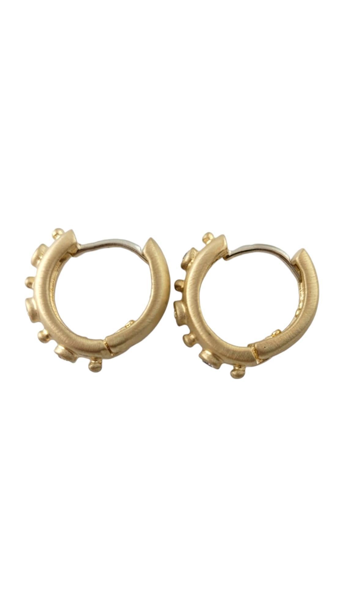14 Karat Yellow Gold Sand Blast Finish Diamond Hoop Earrings

This gorgeous set of hoop earrings with a sand blast finish are crafted from 14K yellow gold and feature 6 stunning single cut diamonds!

Approximate total diamond weight: .12cts

Diamond