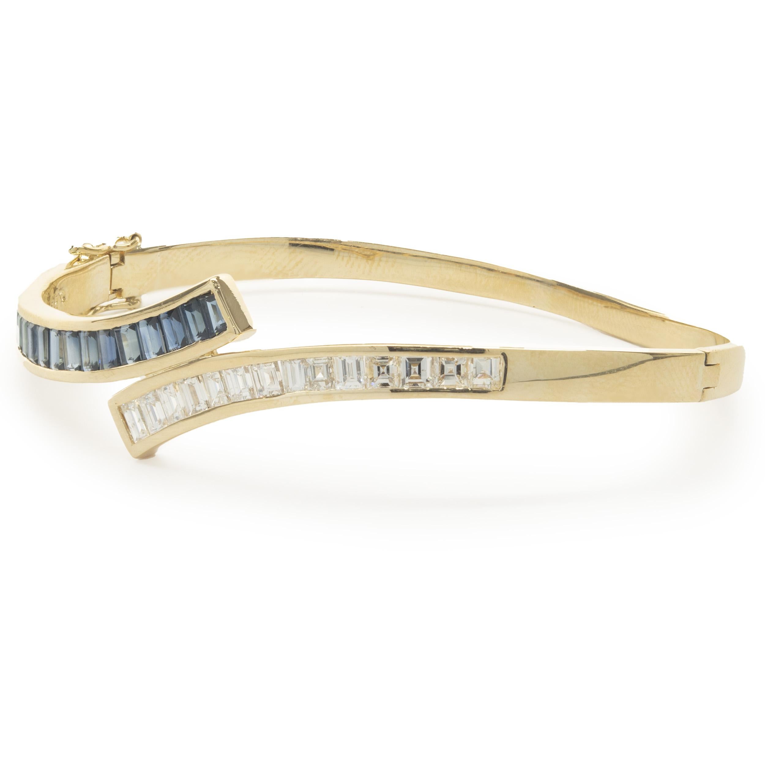 Designer: custom
Material: 14K yellow gold
Diamond: 14 baguette cut = 1.04cttw
Color: G
Clarity: SI1
Weight:  17.49 grams
Dimensions: bracelet will fit up to a 7.25-inch wrist