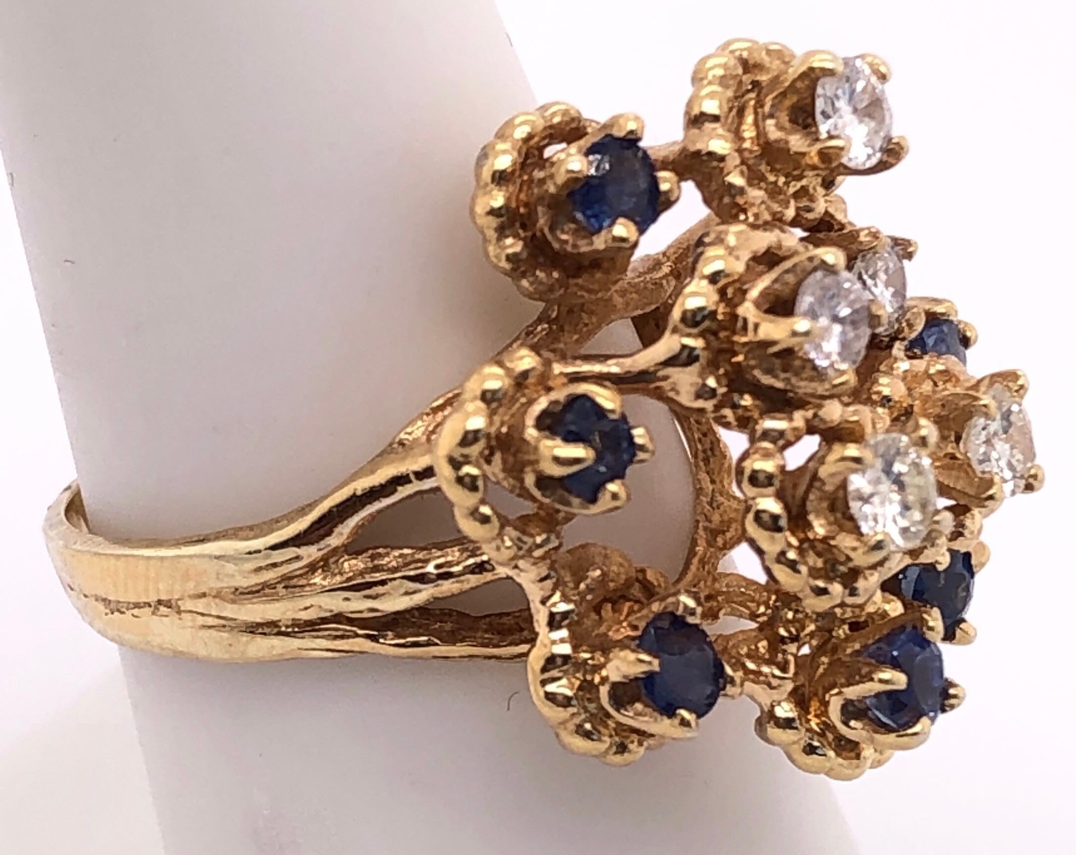 14 Karat Yellow Gold Sapphire and Diamond Cluster Ring In Good Condition For Sale In Stamford, CT