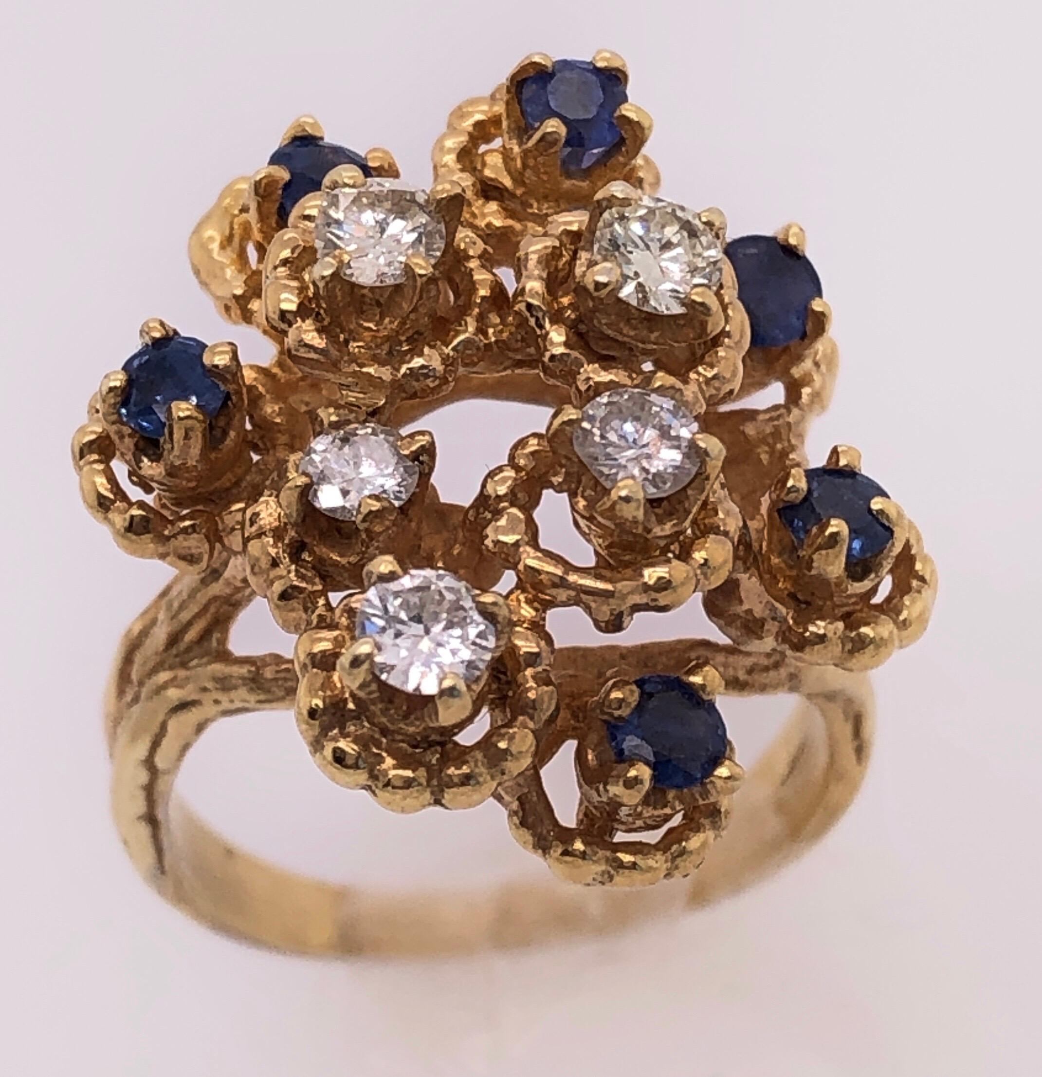 Women's or Men's 14 Karat Yellow Gold Sapphire and Diamond Cluster Ring For Sale