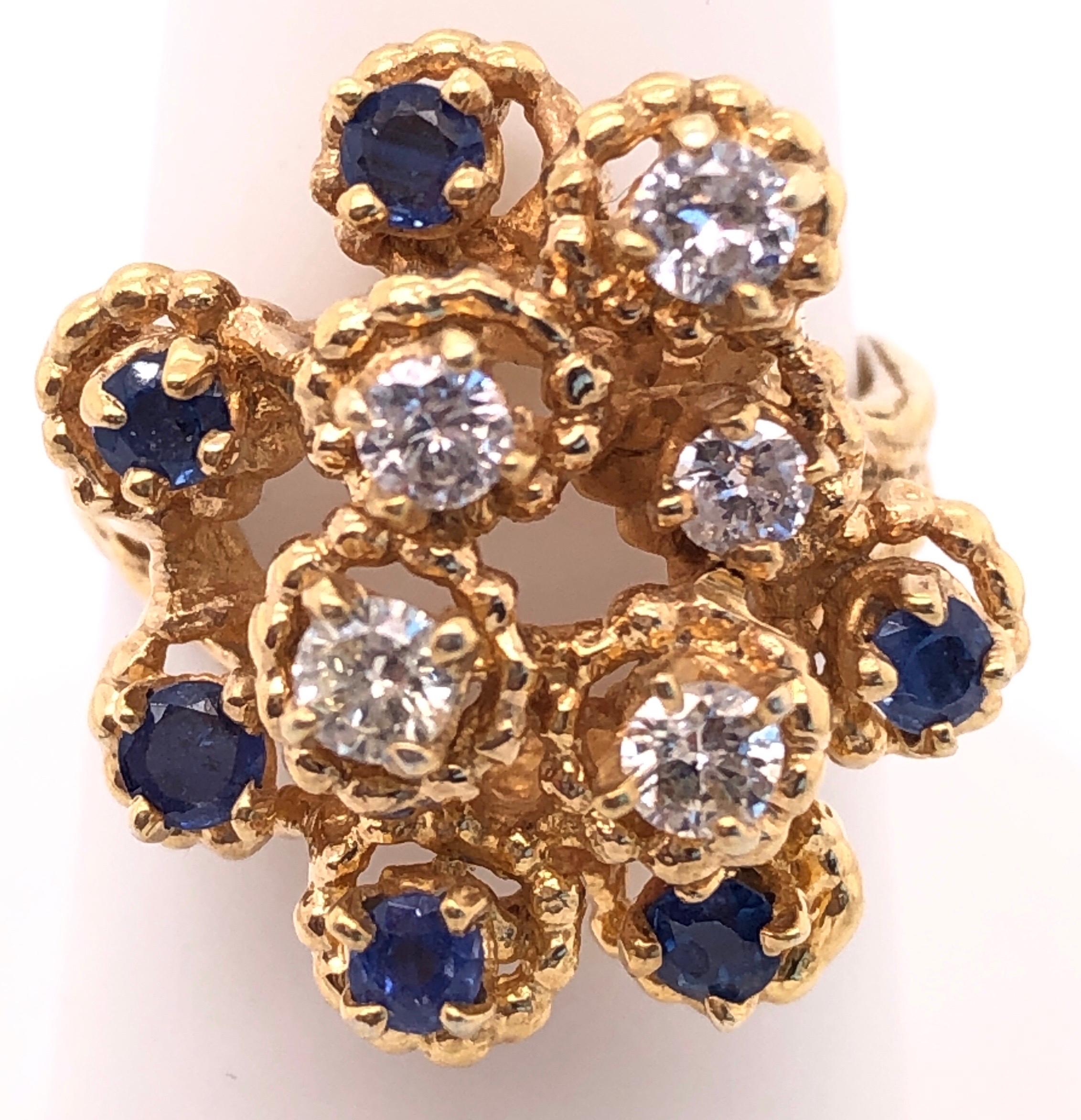14 Karat Yellow Gold Sapphire and Diamond Cluster Ring For Sale 1