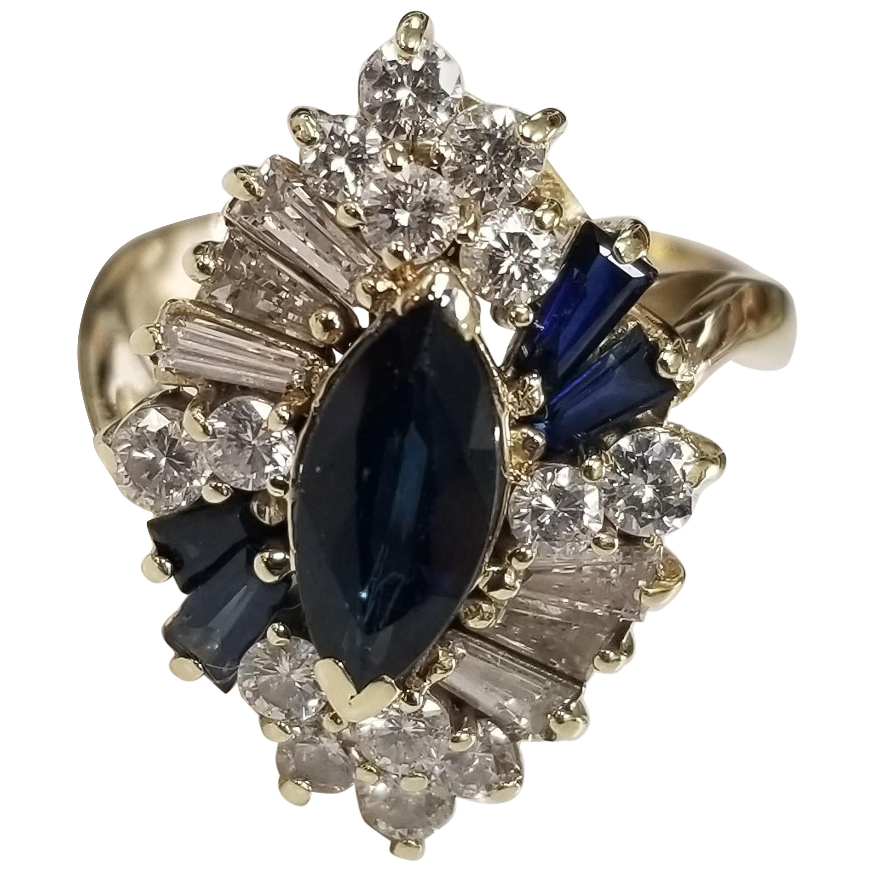 14 Karat Yellow Gold Sapphire and Diamond Cocktail Ring with Marquise Cut Center For Sale