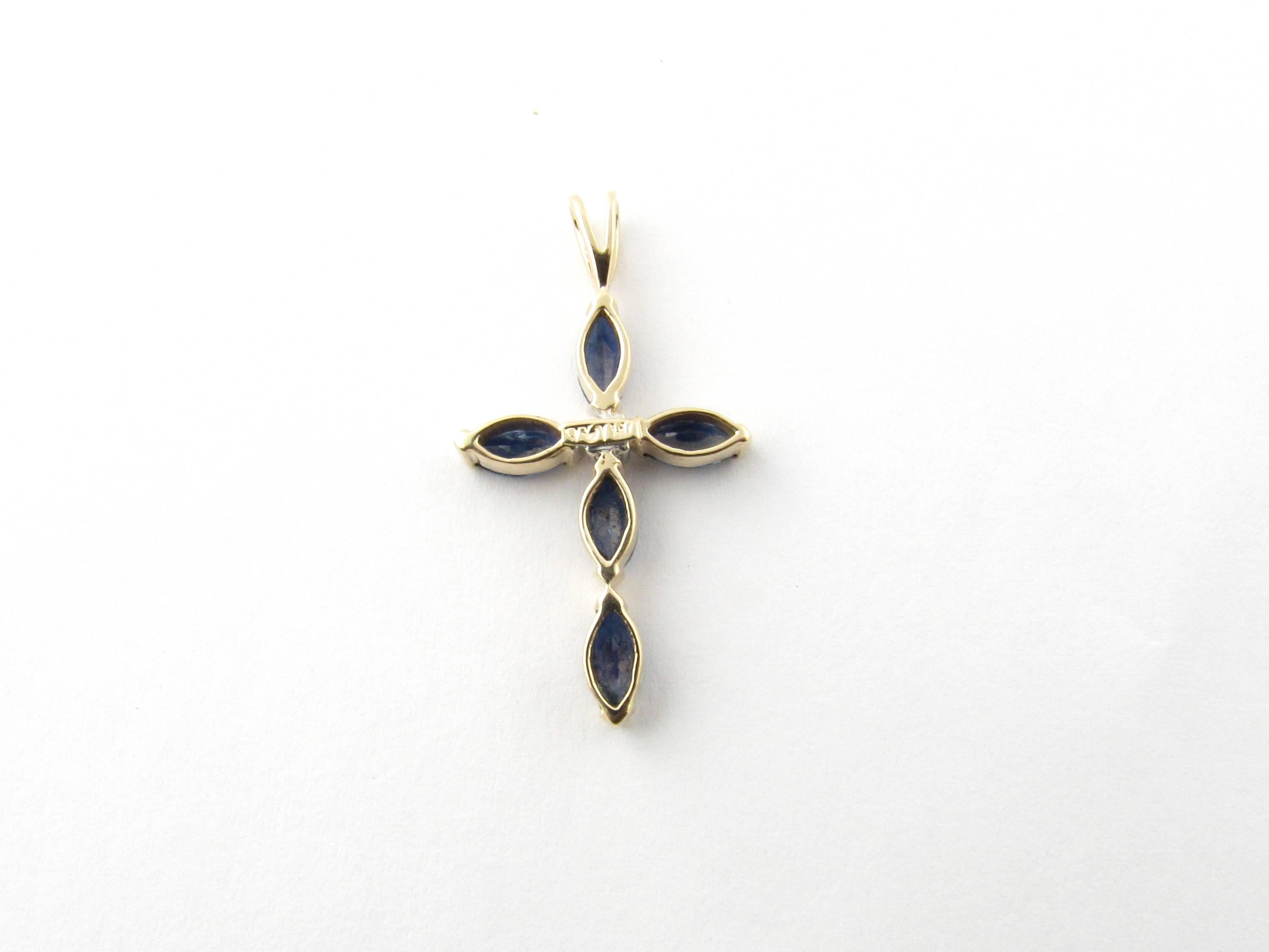Vintage 14 Karat Yellow Gold Sapphire and Diamond Cross Pendant

This stunning cross pendant features five marquis sapphires accented with one round brilliant cut diamond in its center.

Approximate total diamond weight: .01 ct.

Diamond color: