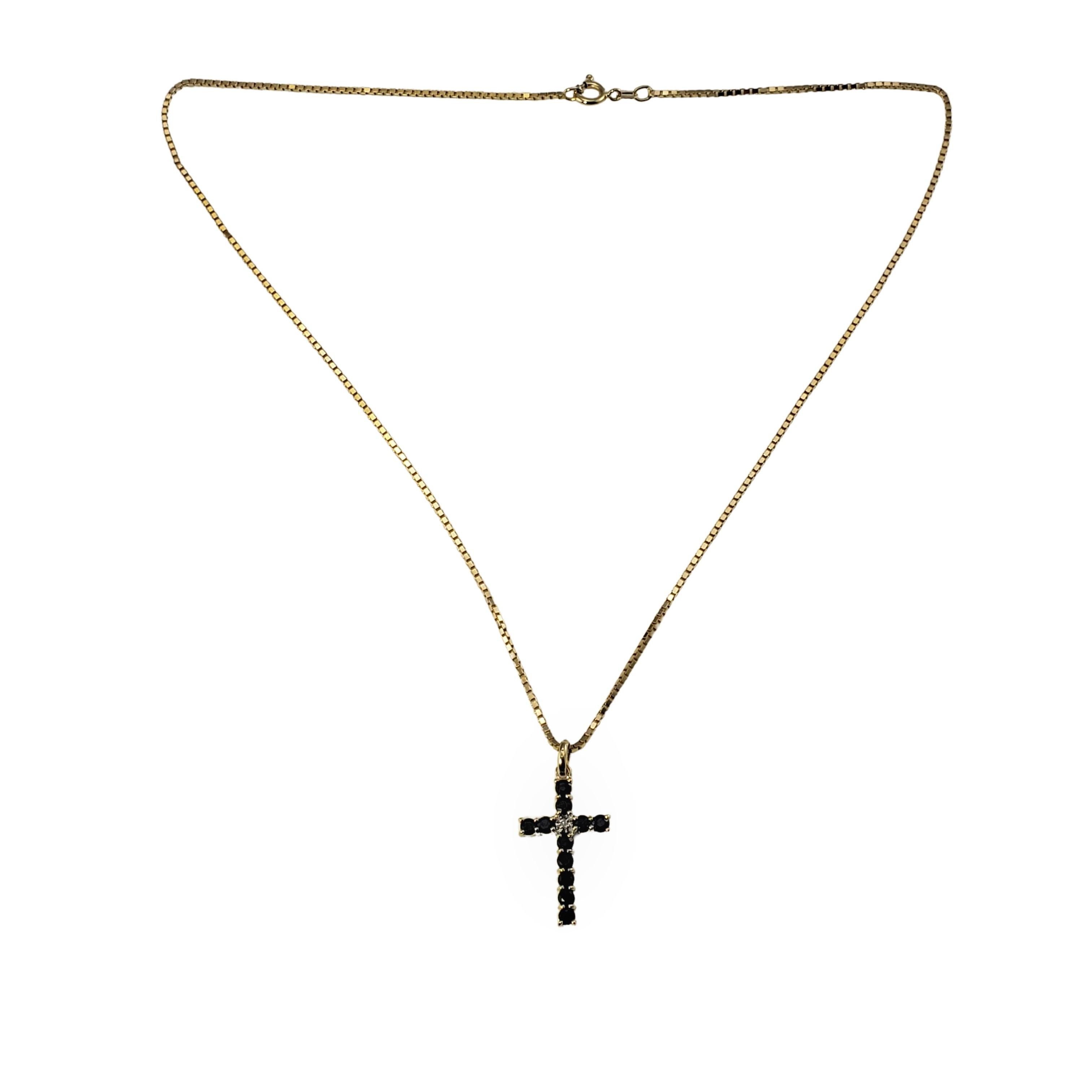 14 Karat Yellow Gold Sapphire and Diamond Cross Pendant Necklace-

This lovely cross pendant features 11 sapphires and one round single cut diamond set in classic 14K yellow gold.  Suspends from a classic box chain.

Approximate total diamond