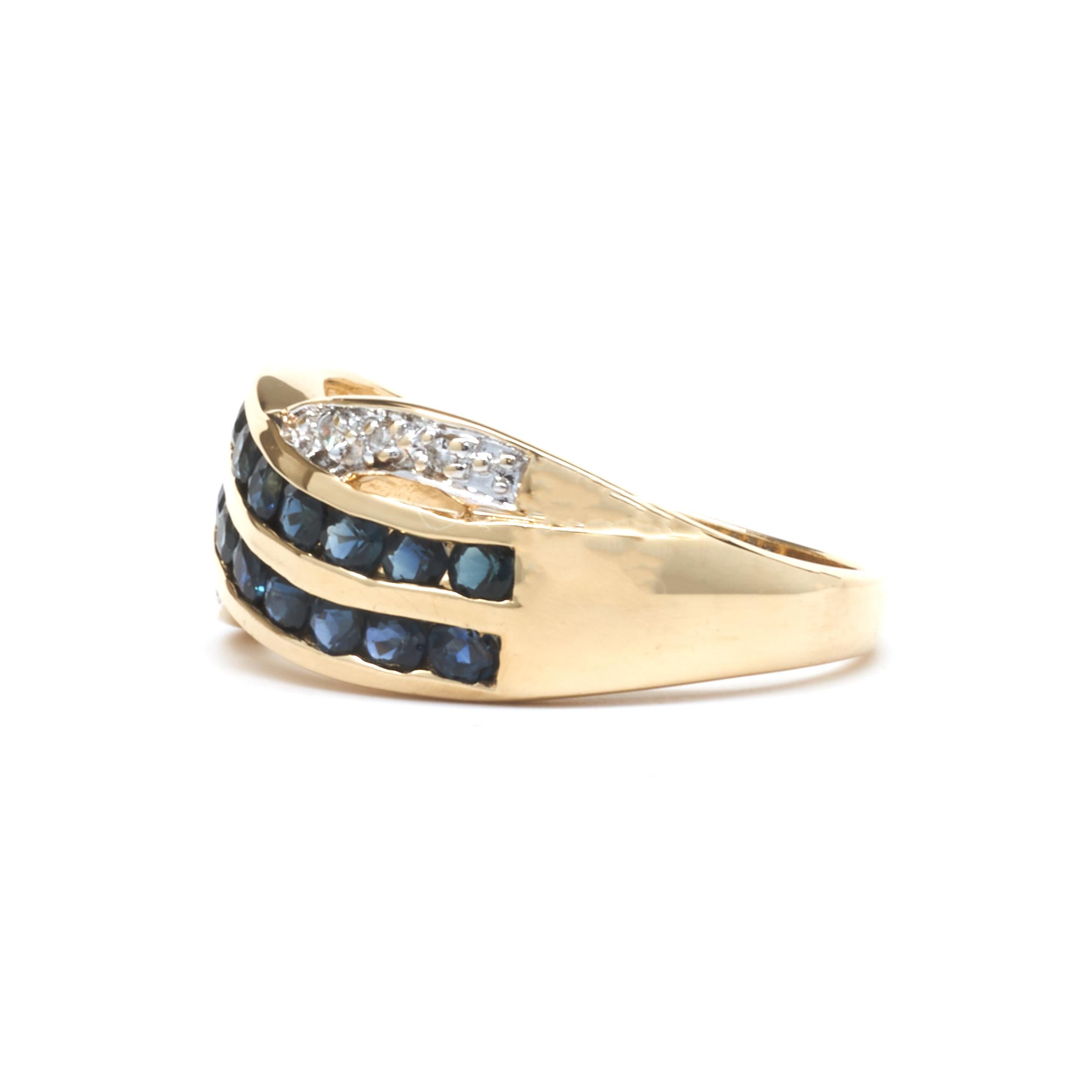 Round Cut 14 Karat Yellow Gold Sapphire and Diamond Crossover Ring For Sale