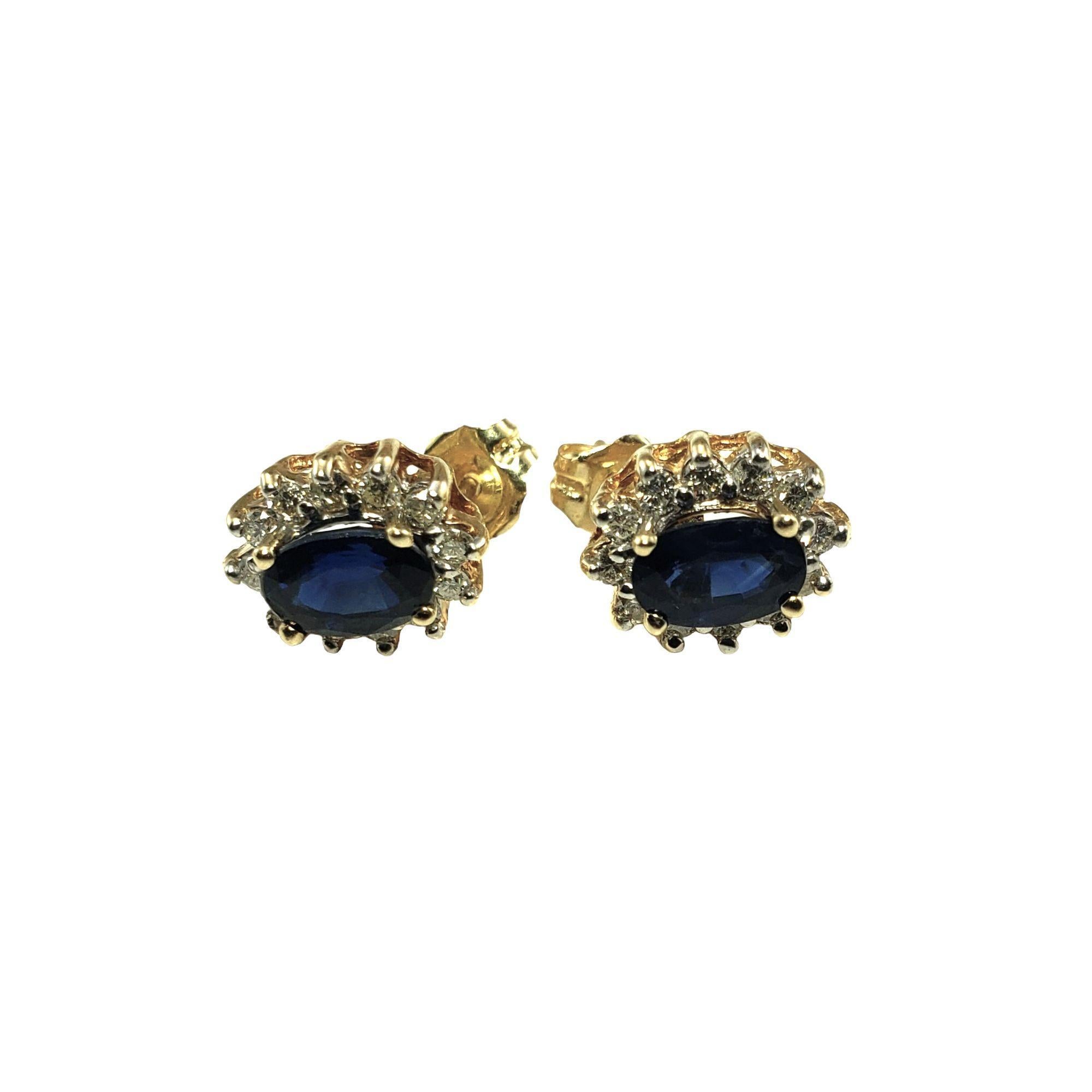 14 Karat Yellow Gold Sapphire and Diamond Earrings-

These lovely earrings each feature one oval sapphire (6 mm x 4 mm) surrounded by 12 round brilliant cut diamonds. Push back closures.

Total sapphire weight:  1.22 ct.

Total diamond weight: .30