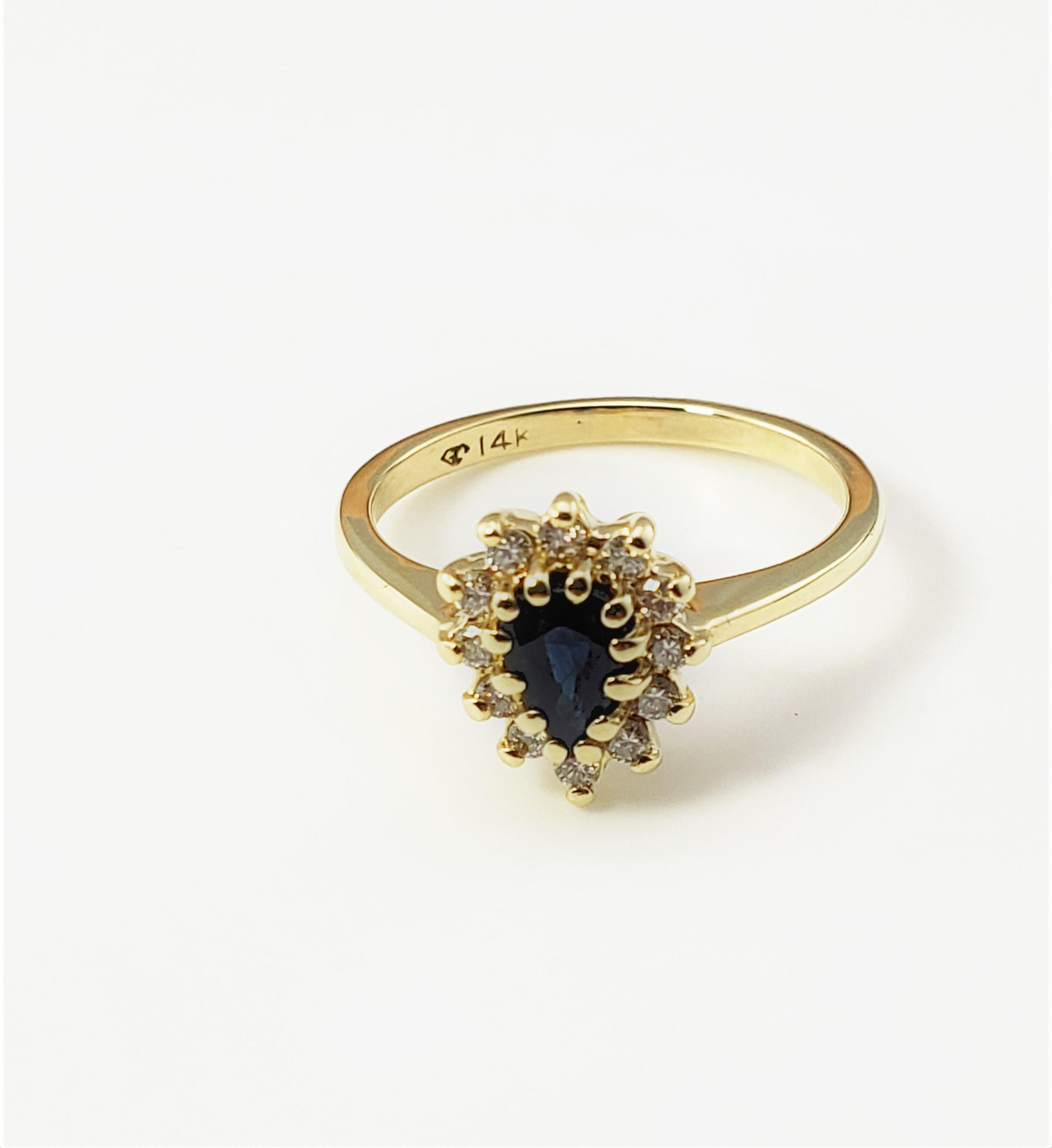 14 Karat Yellow Gold Sapphire and Diamond Ring Size 5.75-

This lovely ring features one pear shaped sapphire (6 mm x 4 mm) and 12 round brilliant cut diamonds set in classic 14K yellow gold.
Top of ring measures 10 mm x 8 mm.  Shank measures 2