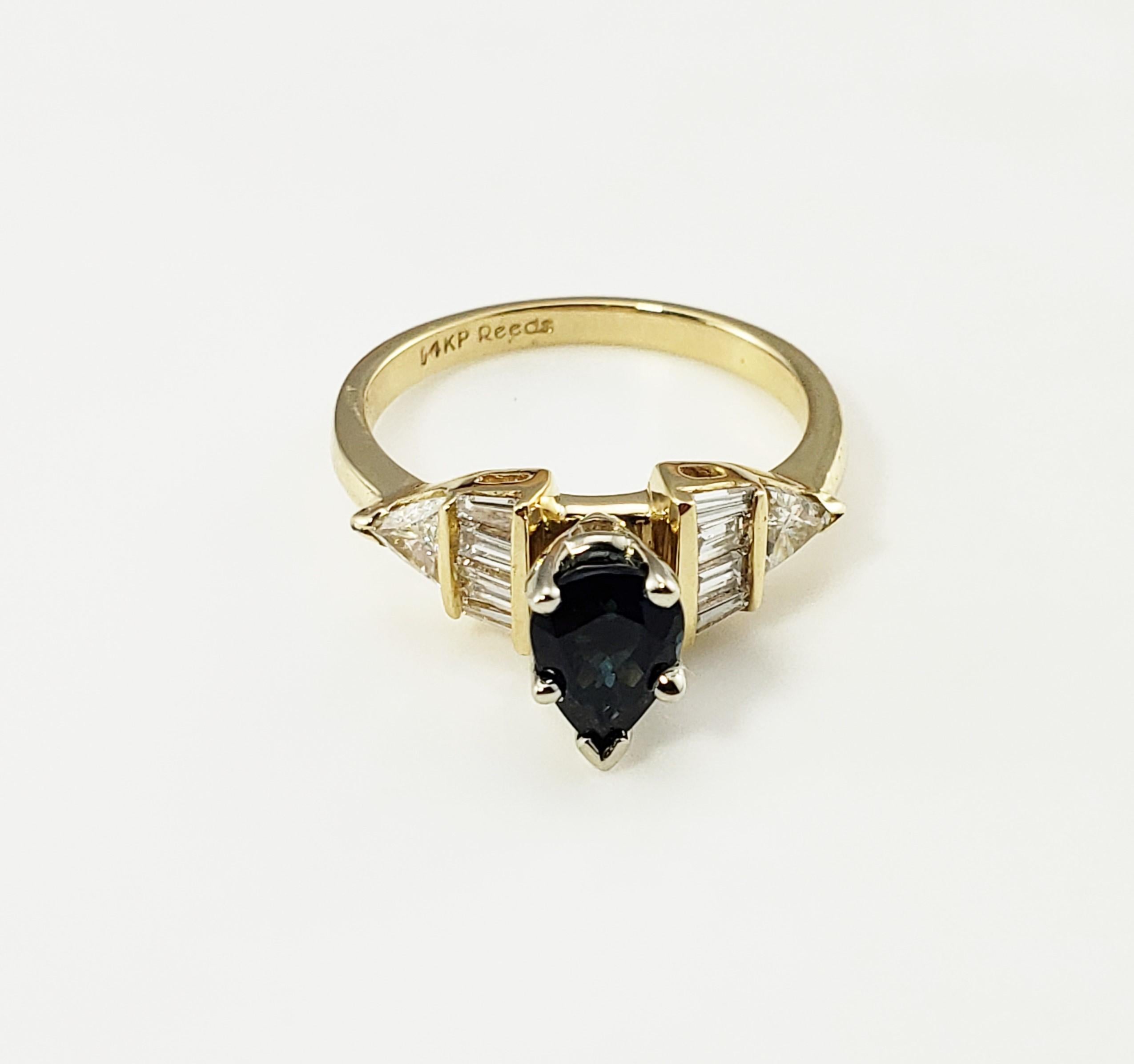 14 Karat Yellow Gold Sapphire and Diamond Ring Size 5.75 GAI Certified-

This lovely ring features one pear shaped sapphire (8 mm x 5 mm), two baguette diamonds and two trillion diamonds set in classic 14K yellow gold.  Shank: 2 mm.  Height:  9