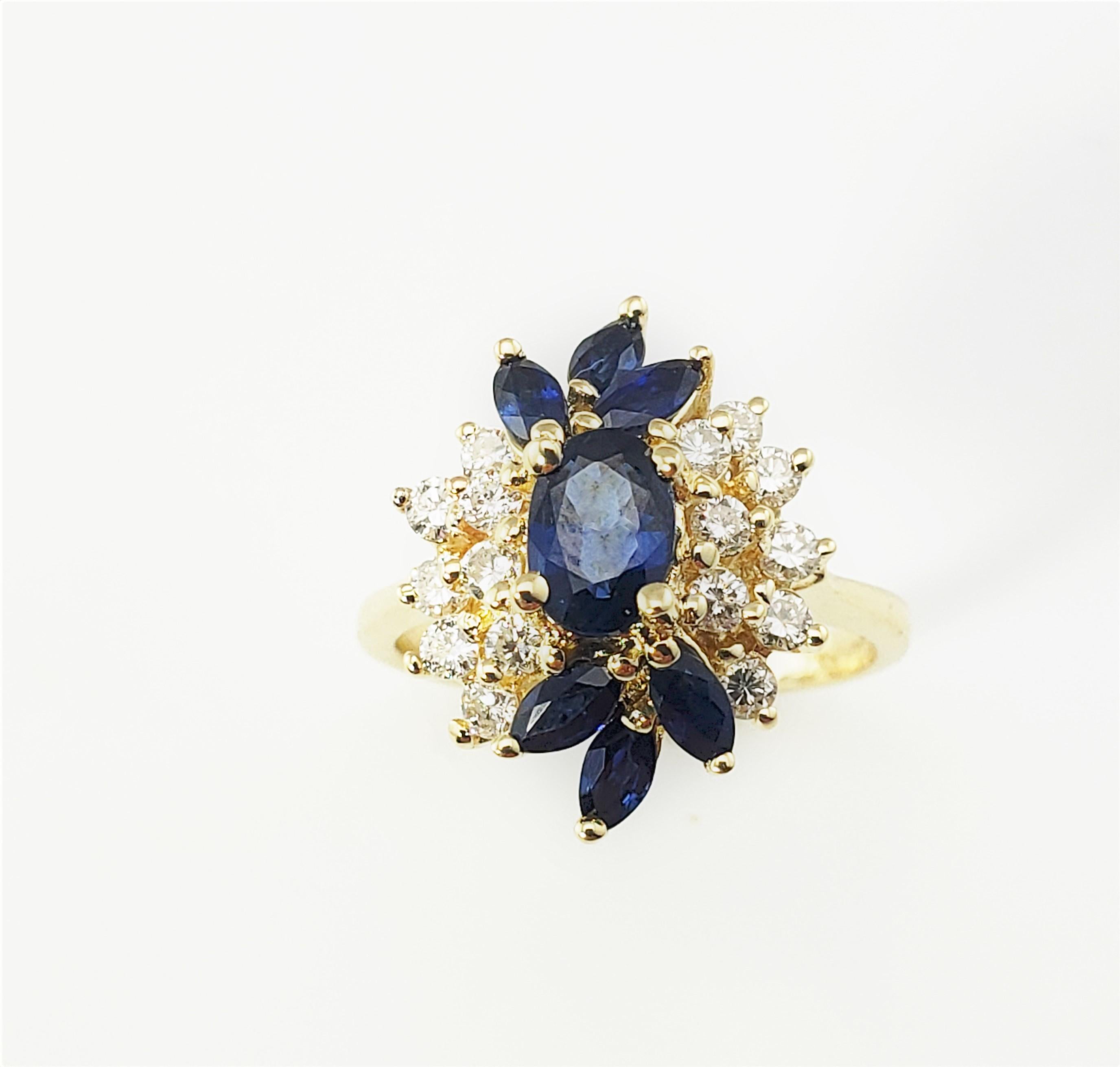 14 Karat Yellow Gold Sapphire and Diamond Ring Size 6.25-

This elegant ring features one oval sapphire, six marquis sapphires and 16 round brilliant cut diamonds set in classic 14K yellow gold.  Top of ring measures 17 mm x 14 mm.  Shank measures 2