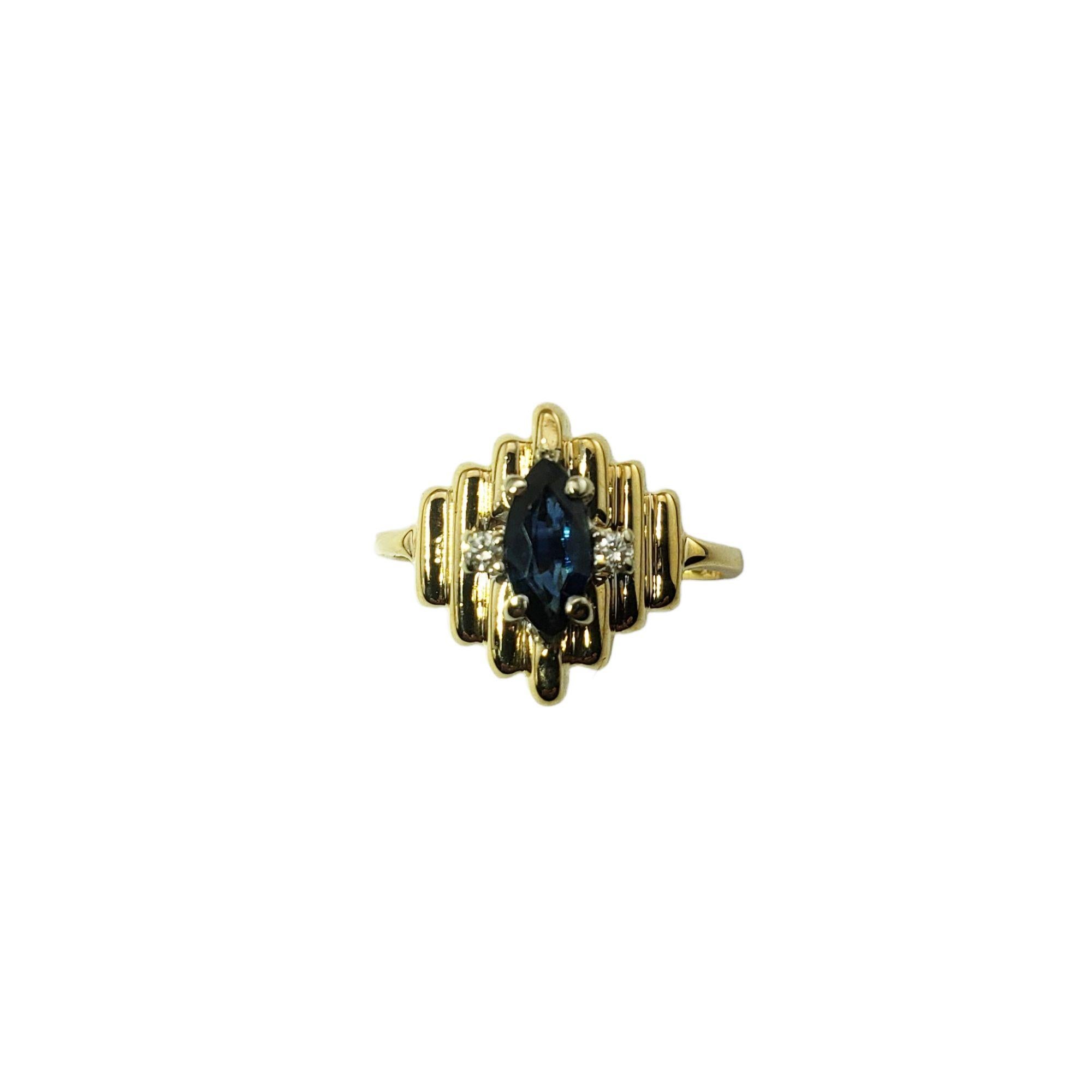 Vintage 14 Karat Yellow Gold Sapphire and Diamond Ring Size 6.5-

This lovely ring features one marquis sapphire (8 mm x 4 mm) and two round brilliant cut diamonds set in 14K yellow gold. Width: 14 mm.
Shank: 2 mm.

Approximate total diamond weight: