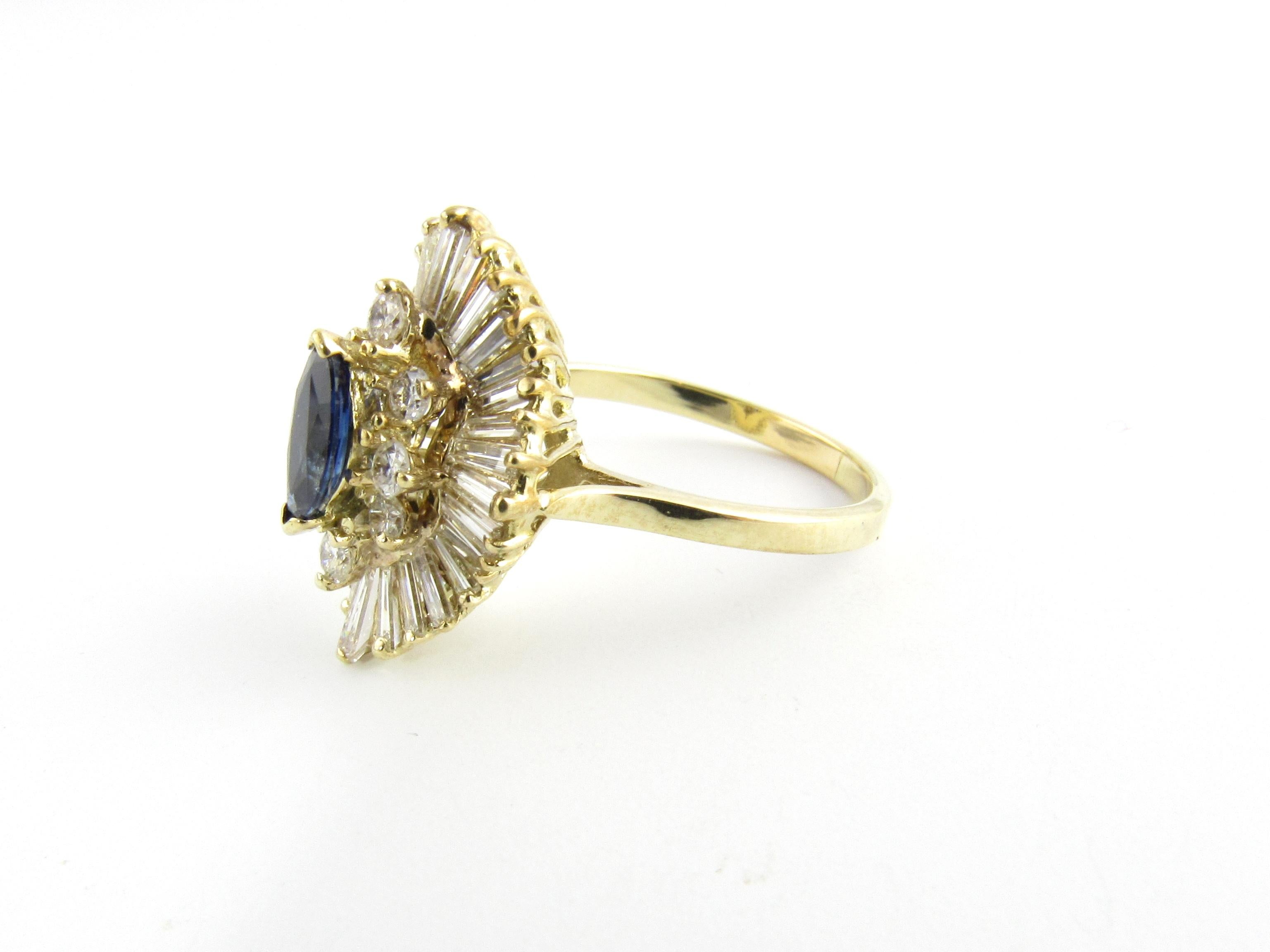14 Karat Yellow Gold Sapphire and Diamond Ring Size 7.75-

This stunning ring features a genuine marquis sapphire (8 mm x 4 mm) surrounded by eight round diamonds and 32 baguette diamonds in a gorgeous ballerina setting. Top of ring measures 19 mm x
