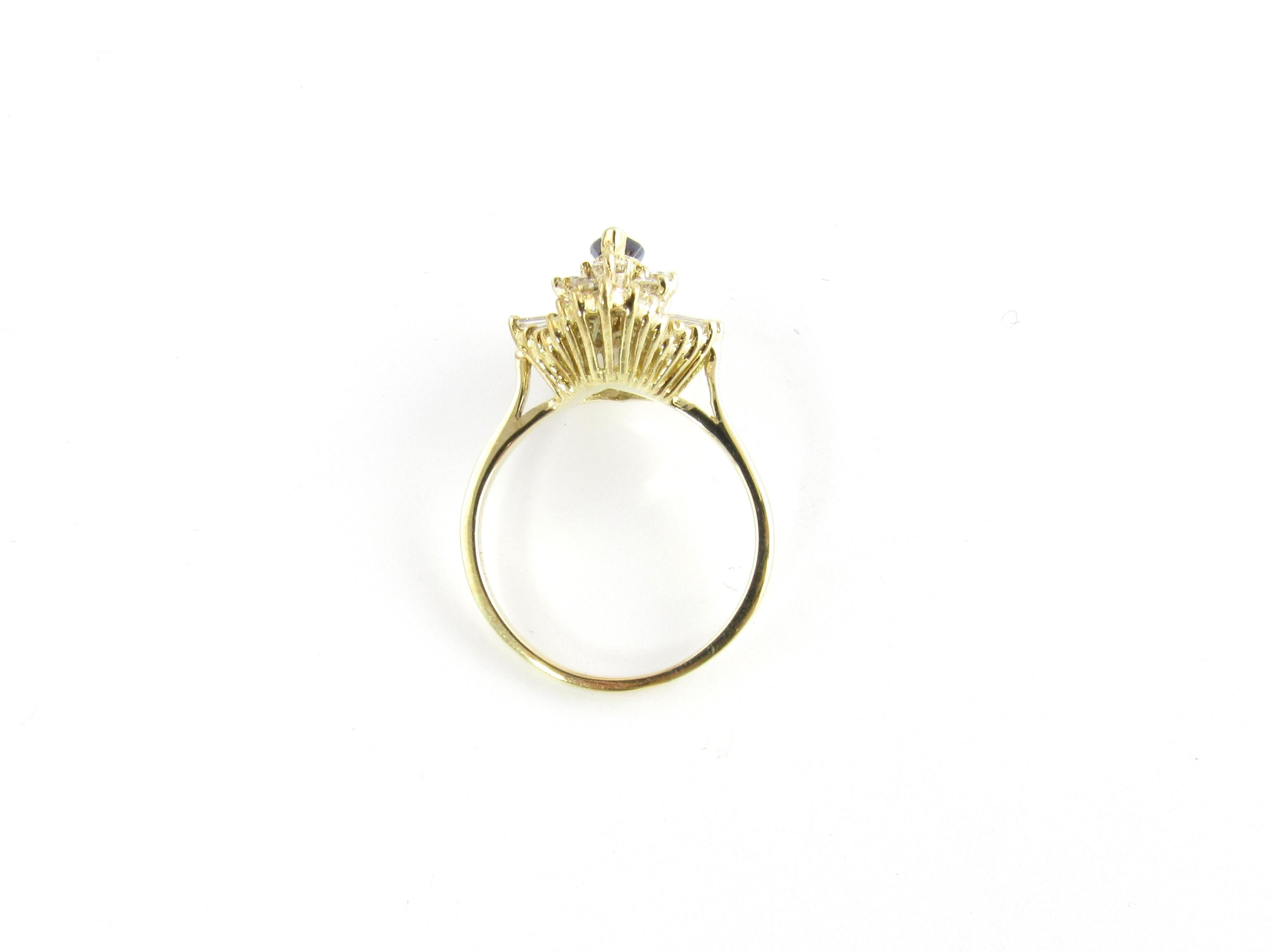 Round Cut 14 Karat Yellow Gold Sapphire and Diamond Ring