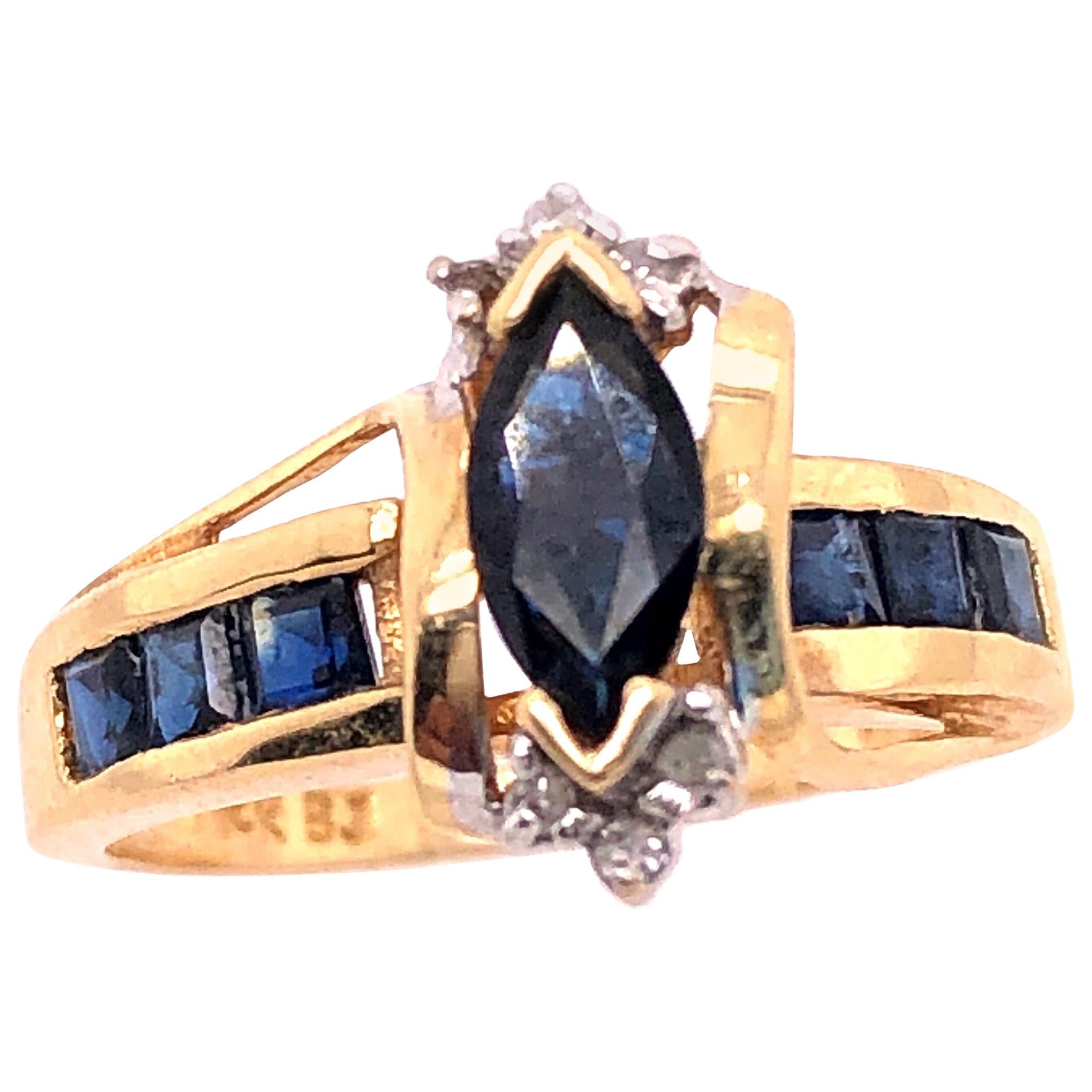 14 Karat Yellow Gold Sapphire Ring with Diamond Accents For Sale