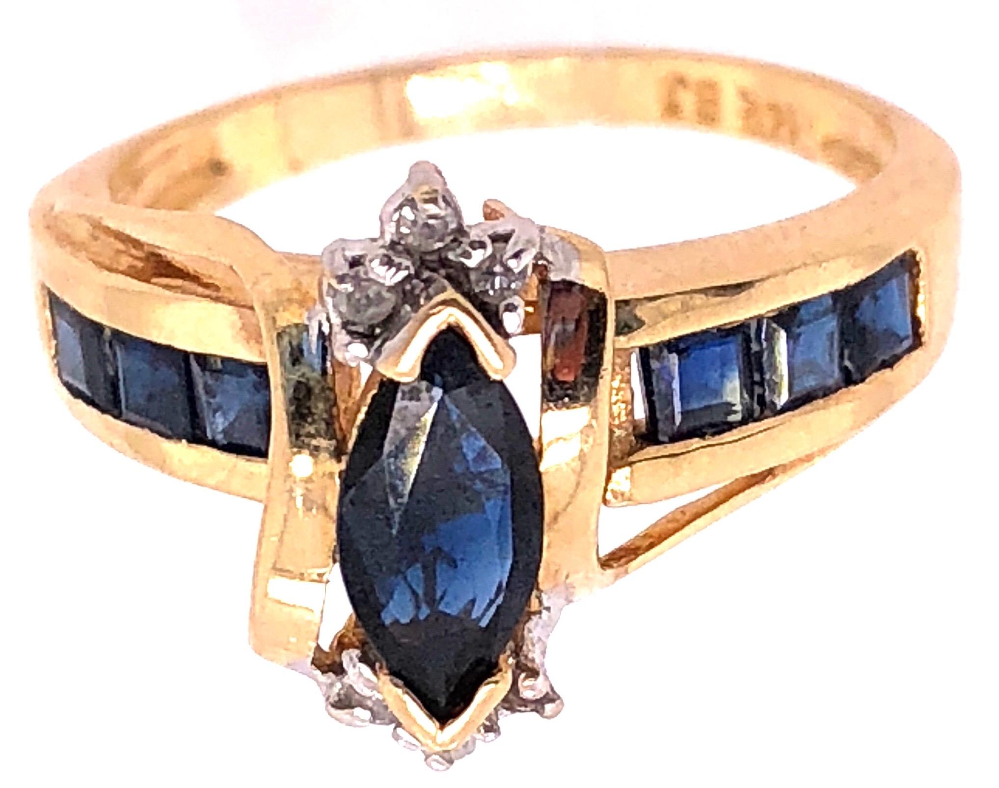14 Karat Yellow Gold Sapphire Ring With Diamond Accents
Size 6.5
4 grams total weight.