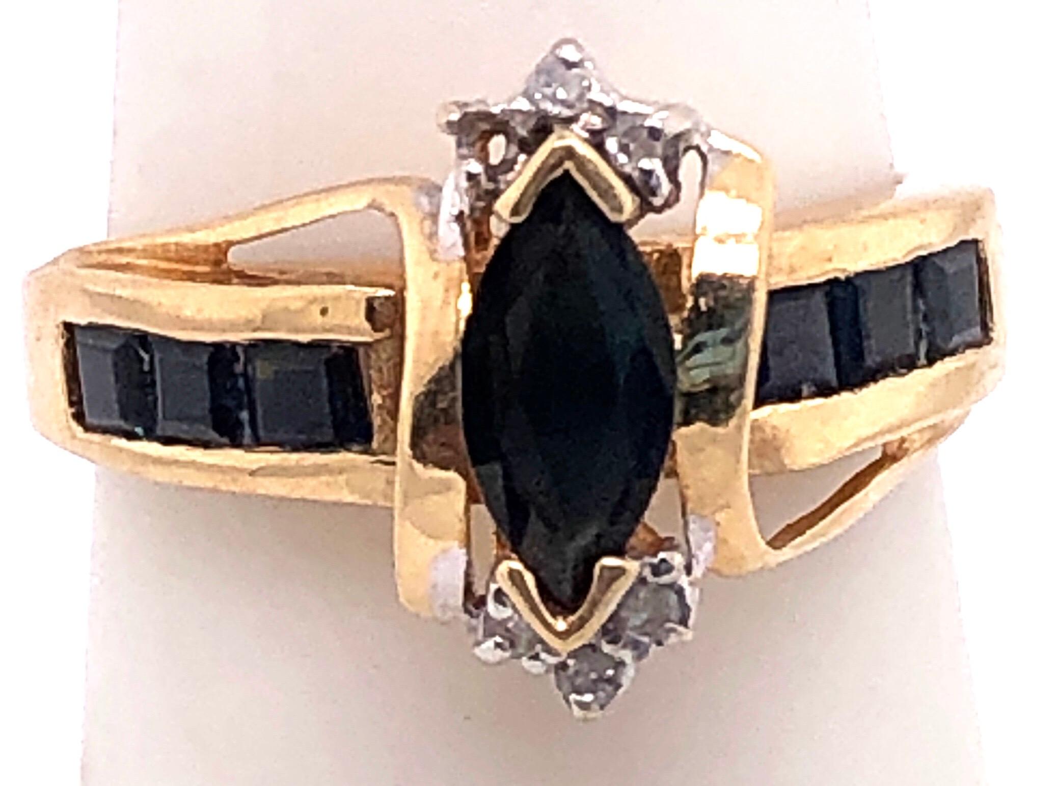 14 Karat Yellow Gold Sapphire Ring with Diamond Accents In Good Condition For Sale In Stamford, CT