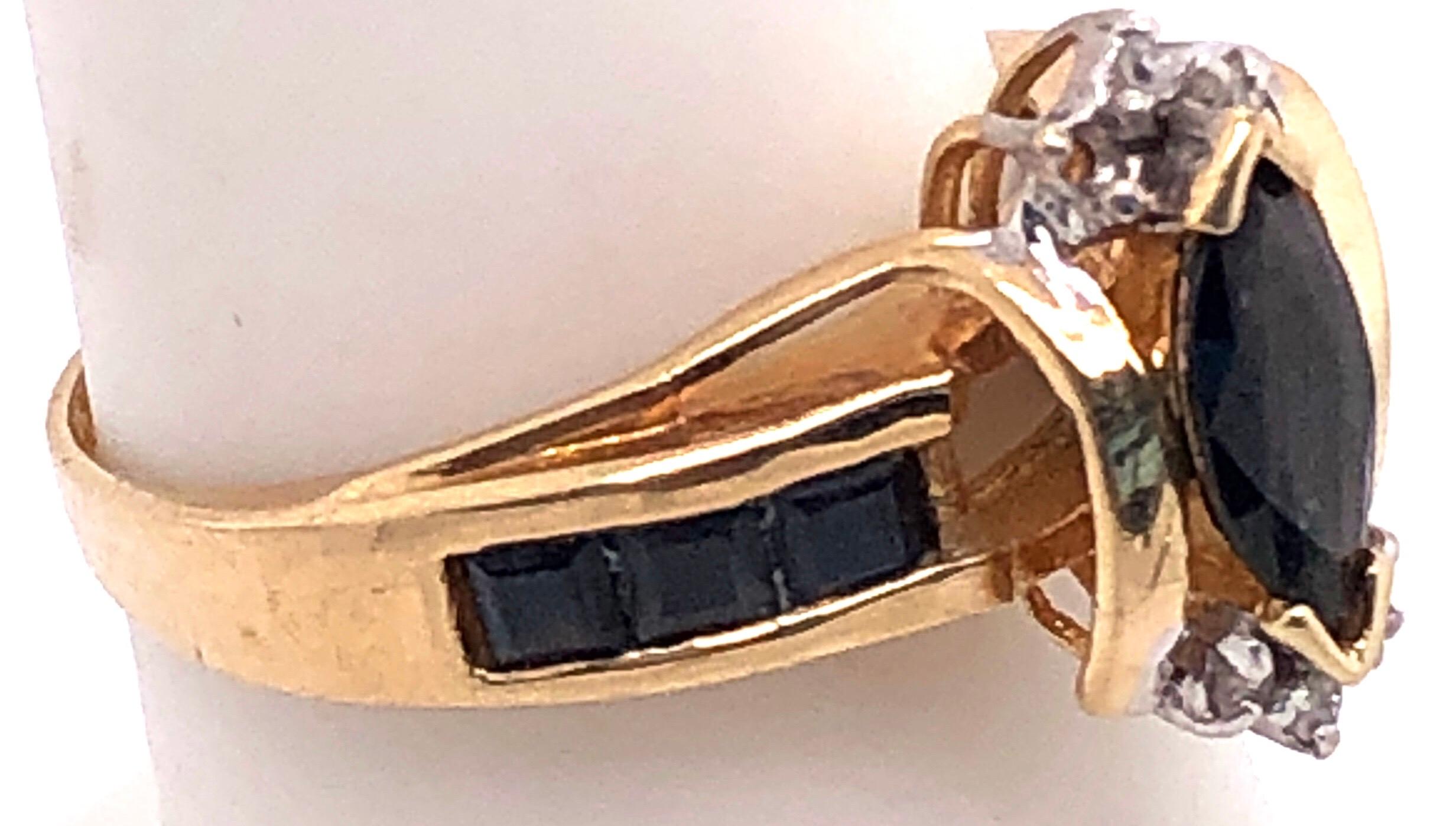 14 Karat Yellow Gold Sapphire Ring with Diamond Accents For Sale 1