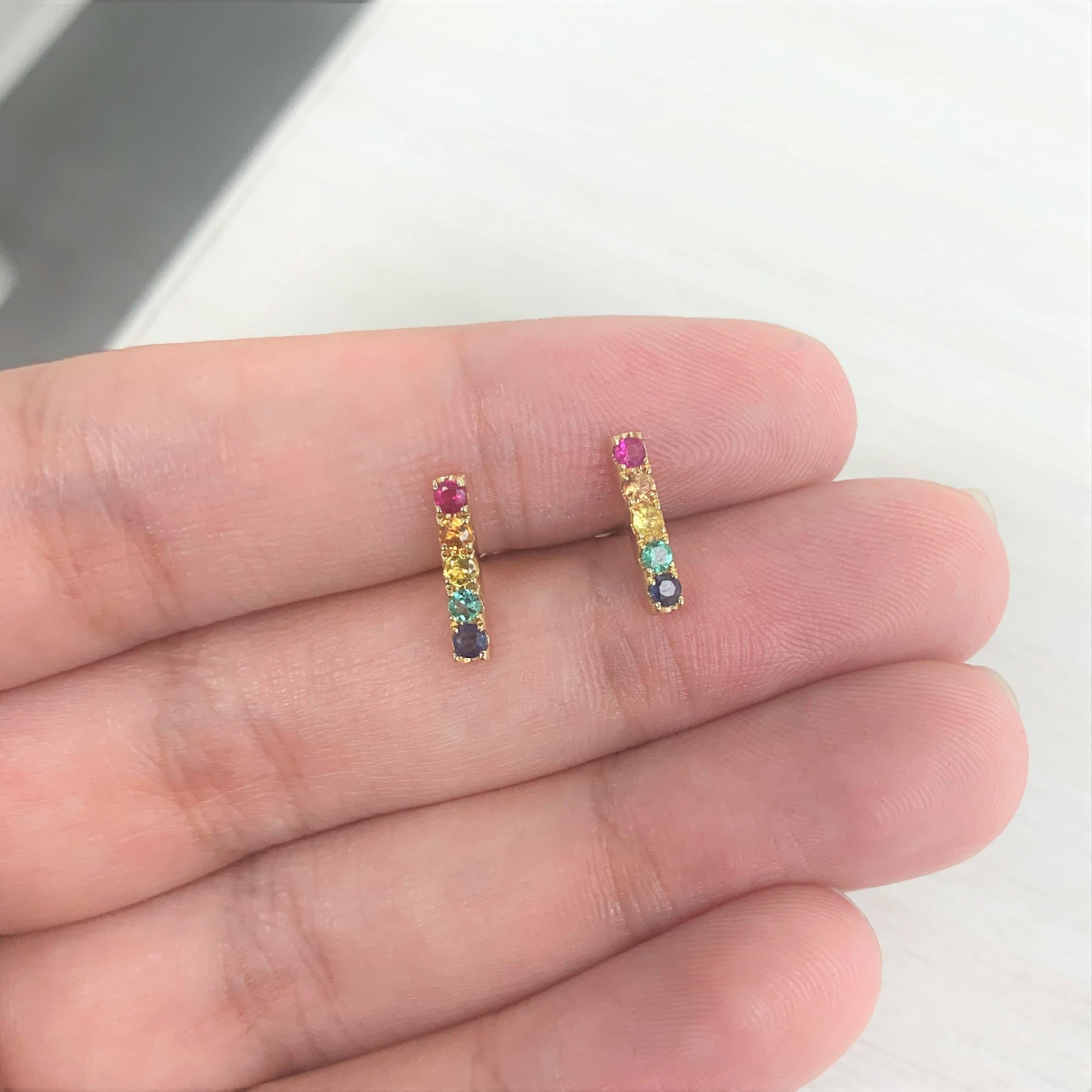 These are a Beautiful and Complimentary addition to your look! Crafted of 14K Yellow Gold these Bar Earrings feature 0.13cts of Sapphire, 0.05cts of Ruby and 0.04cts of Emeralds. Butterfly Pushback closure. Measures 10mm in Length
-14K Yellow