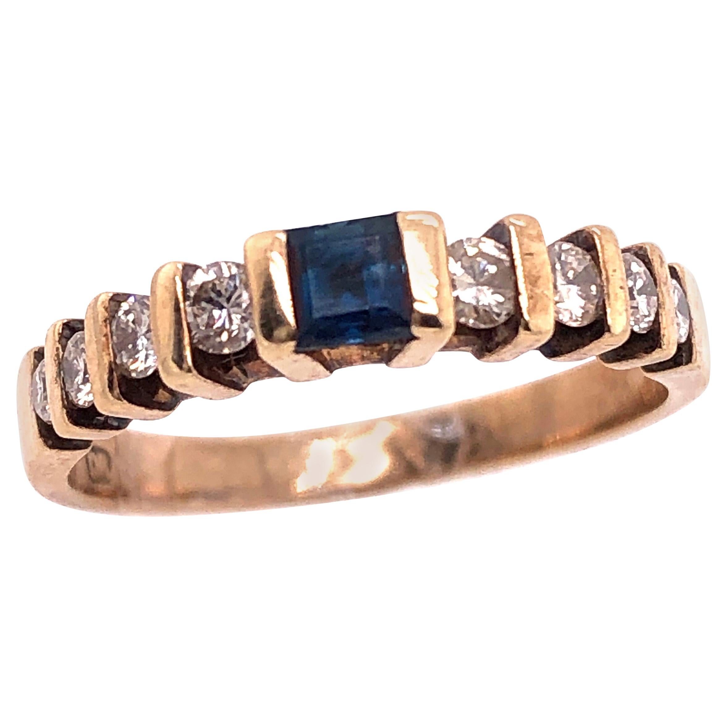 14 Karat Yellow Gold Sapphire Solitaire Band with Diamond Accents Ring For Sale