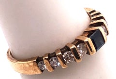 14 Karat Yellow Gold Sapphire Solitaire Band with Diamond Accents Ring