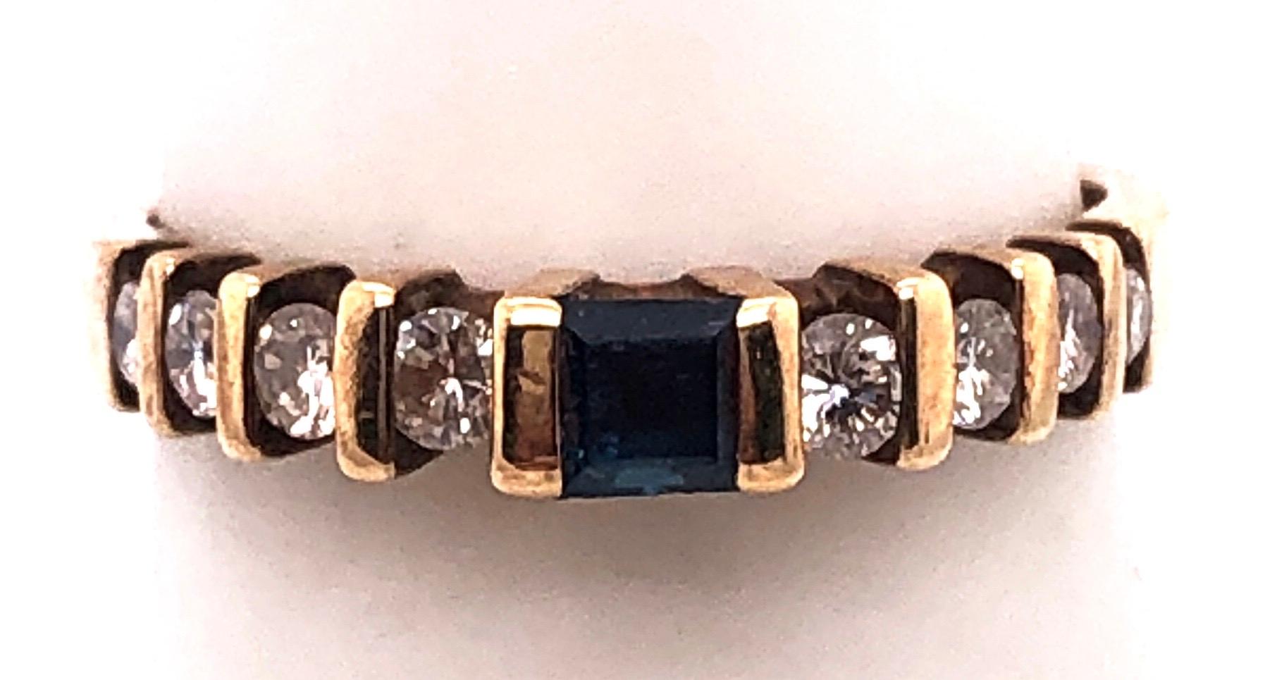 14 Karat Yellow Gold Sapphire Solitaire Band with Diamond Accents Ring In Good Condition For Sale In Stamford, CT
