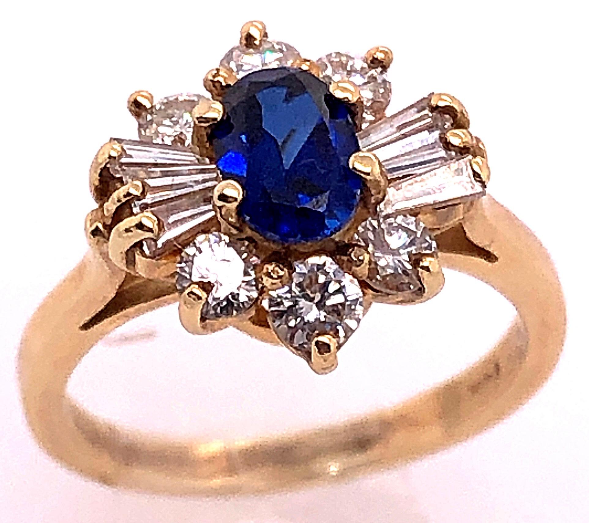 Modern 14 Karat Yellow Gold Sapphire Solitaire Ring with Diamond Accents For Sale