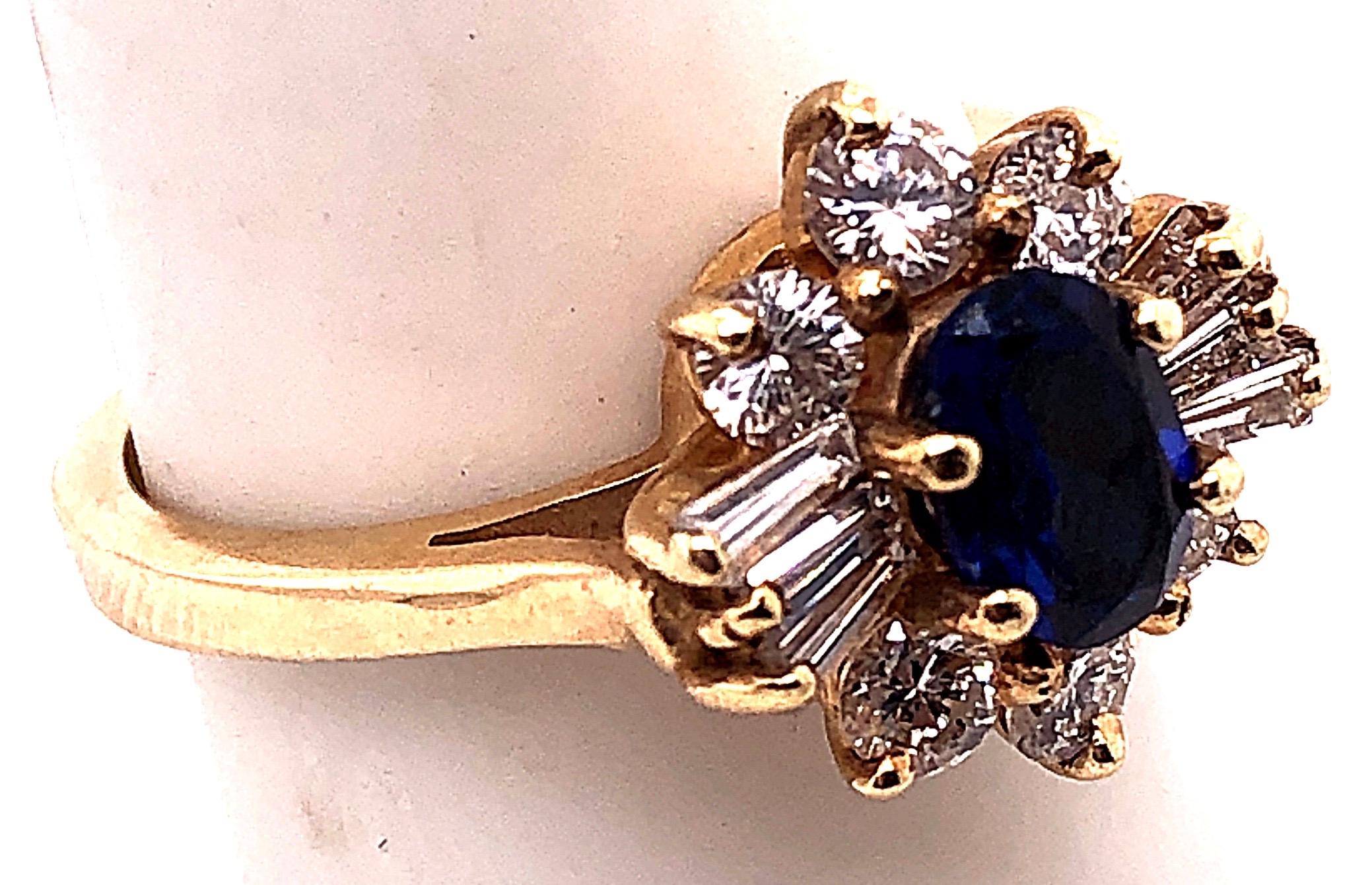 Oval Cut 14 Karat Yellow Gold Sapphire Solitaire Ring with Diamond Accents For Sale