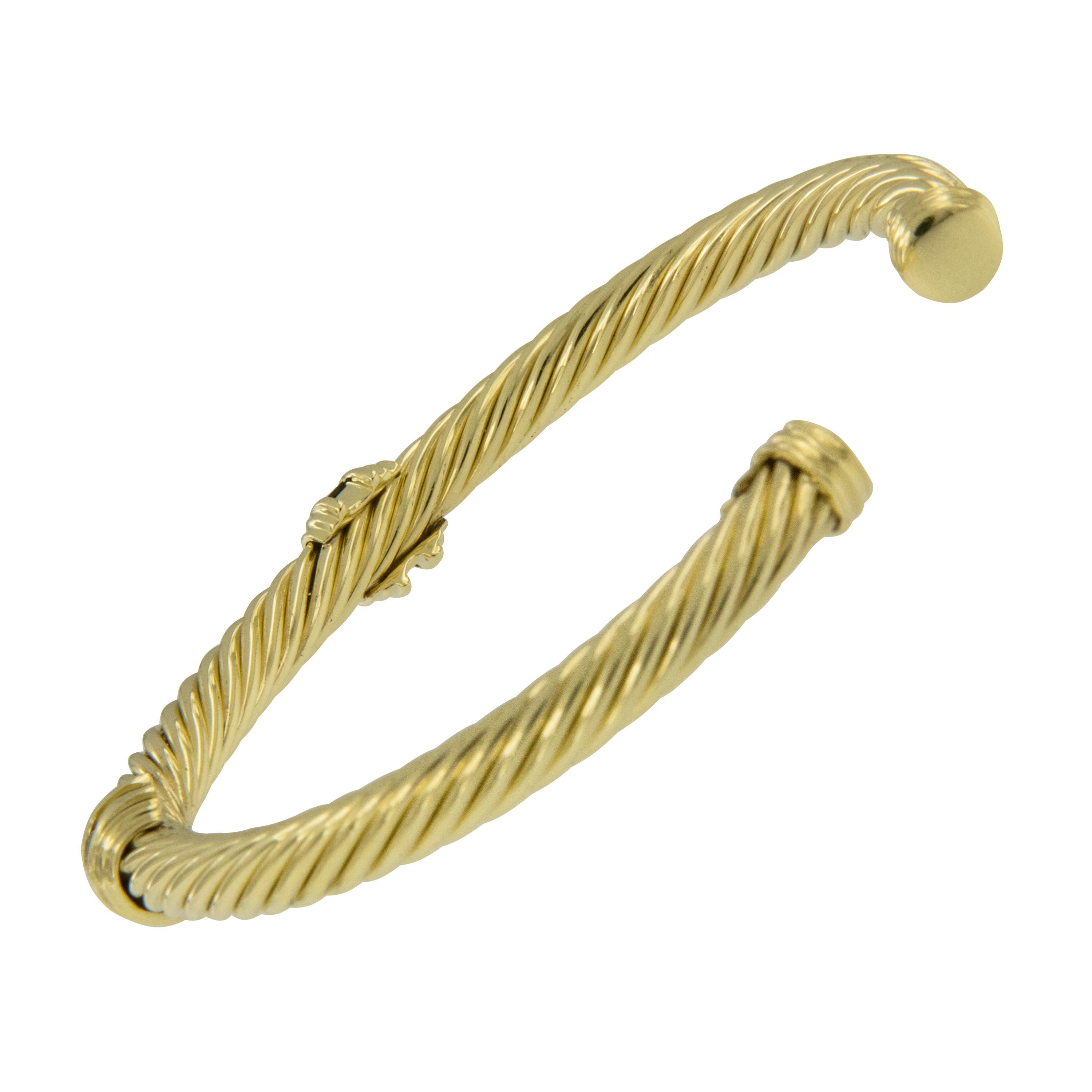 Timeless David Yurman design cable spira cuff bracelet with double square cut sapphire stations. This bracelet looks fantastic on your wrist alone or stacked . Cuff style bangle is convenient for ease of on & off your wrist. Complimentary signature