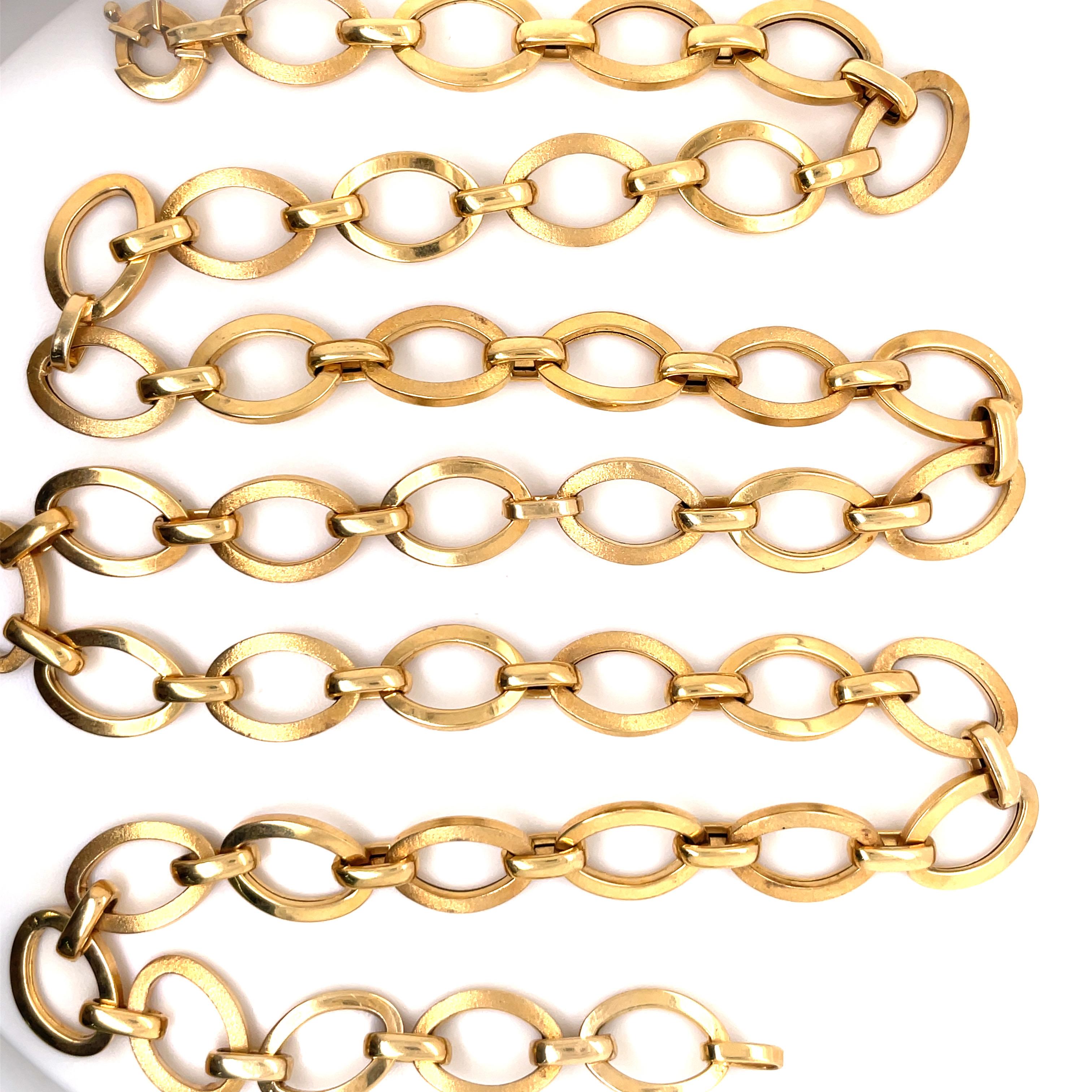 14 Karat Yellow Gold link necklace featuring alternate oval satin & polish links weighing 34.2 grams, 30.5 inches.
 Ovals measure 0.63 *0.45 inches
Made in Italy