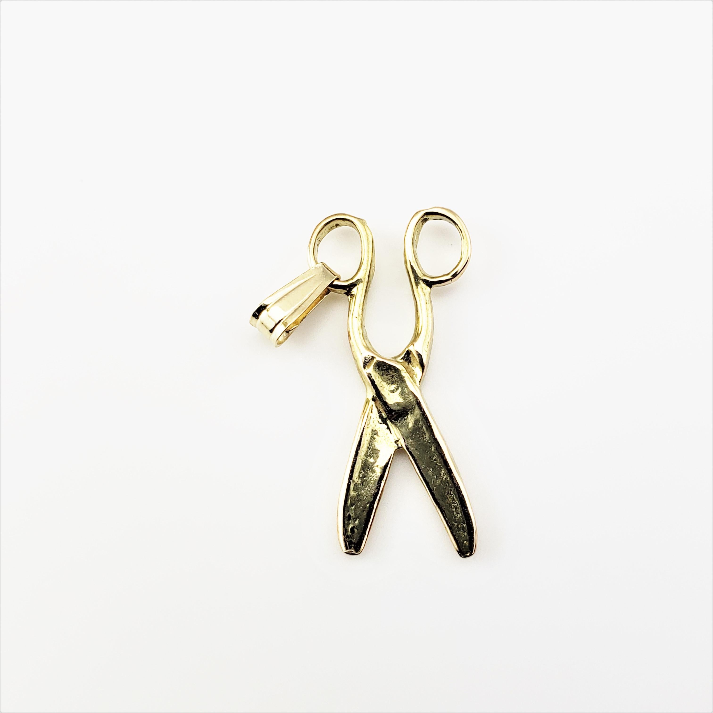 14 Karat Yellow Gold Scissors Charm-

This lovely charm features a miniature pair of scissors meticulously detailed in 14K yellow gold.

*Chain not included

Size: 21 mm x 8 mm (actual charm)

Weight:  0.6 dwt. /  1.0 gr.

Acid tested for 14K
