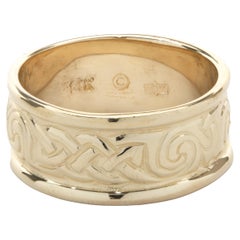 14 Karat Yellow Gold Scroll Band
