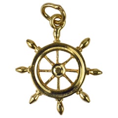 14 Karat Yellow Gold Ships Wheel Charm Pendant