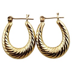 14 Karat Yellow Gold Shrimp Style Oval Hoop Earrings #19768