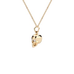 14 Karat Yellow Gold Skull Pendant with White Diamond Eyes