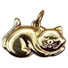 Breloque chat en or jaune 14 carats endormi n° 19985