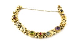 14 Karat Yellow Gold Slide Charm Bracelet with Multiple Gemstones and Diamonds