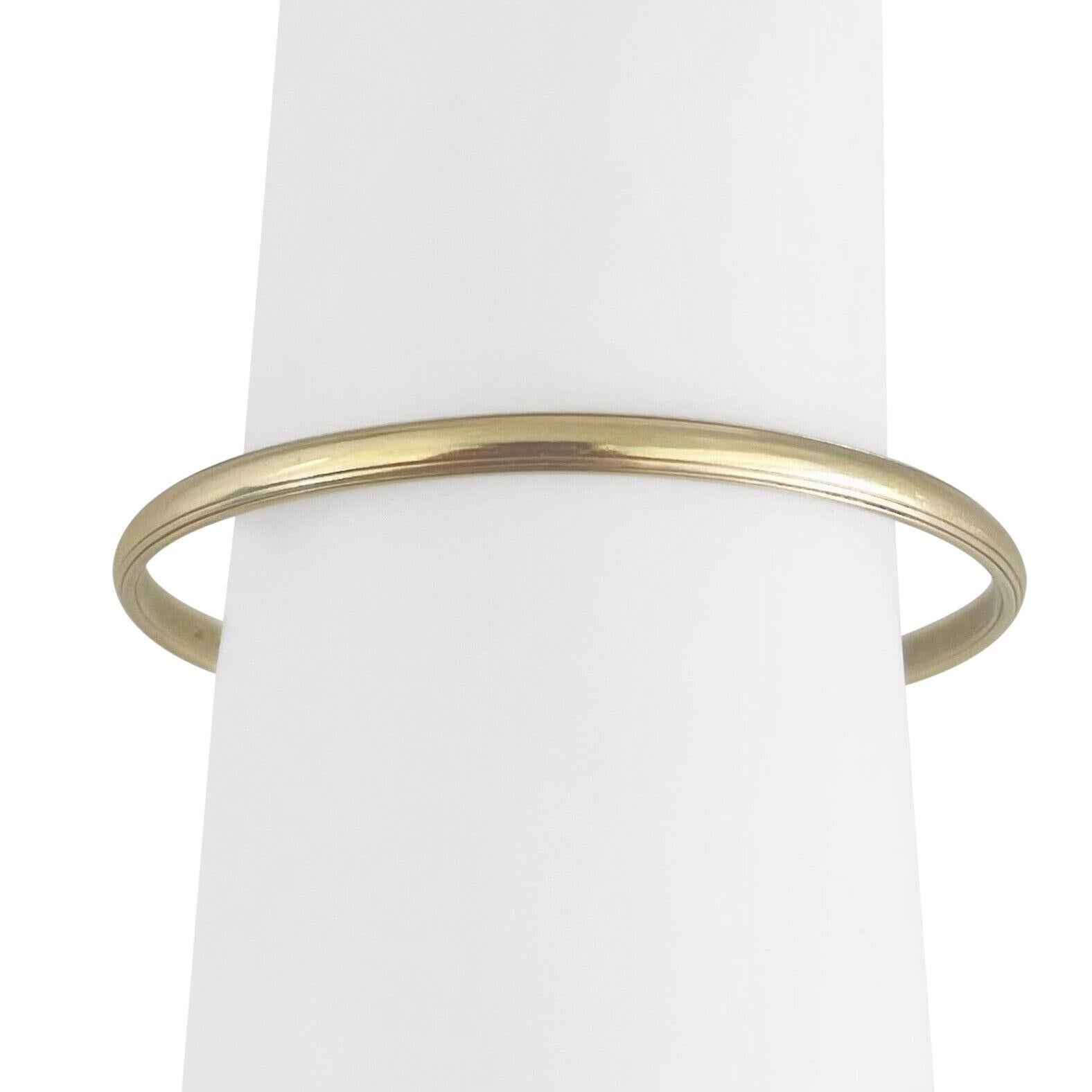 Armreif aus 14 Karat Gelbgold mit massivem Damenarmband 3