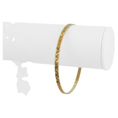 Armreif aus 14 Karat Gelbgold mit massivem Diamantschliff für Damen