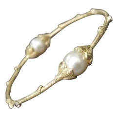 Oro giallo 14 carati, perle dei mari del sud e diamanti, braccialetto a forma di corteccia