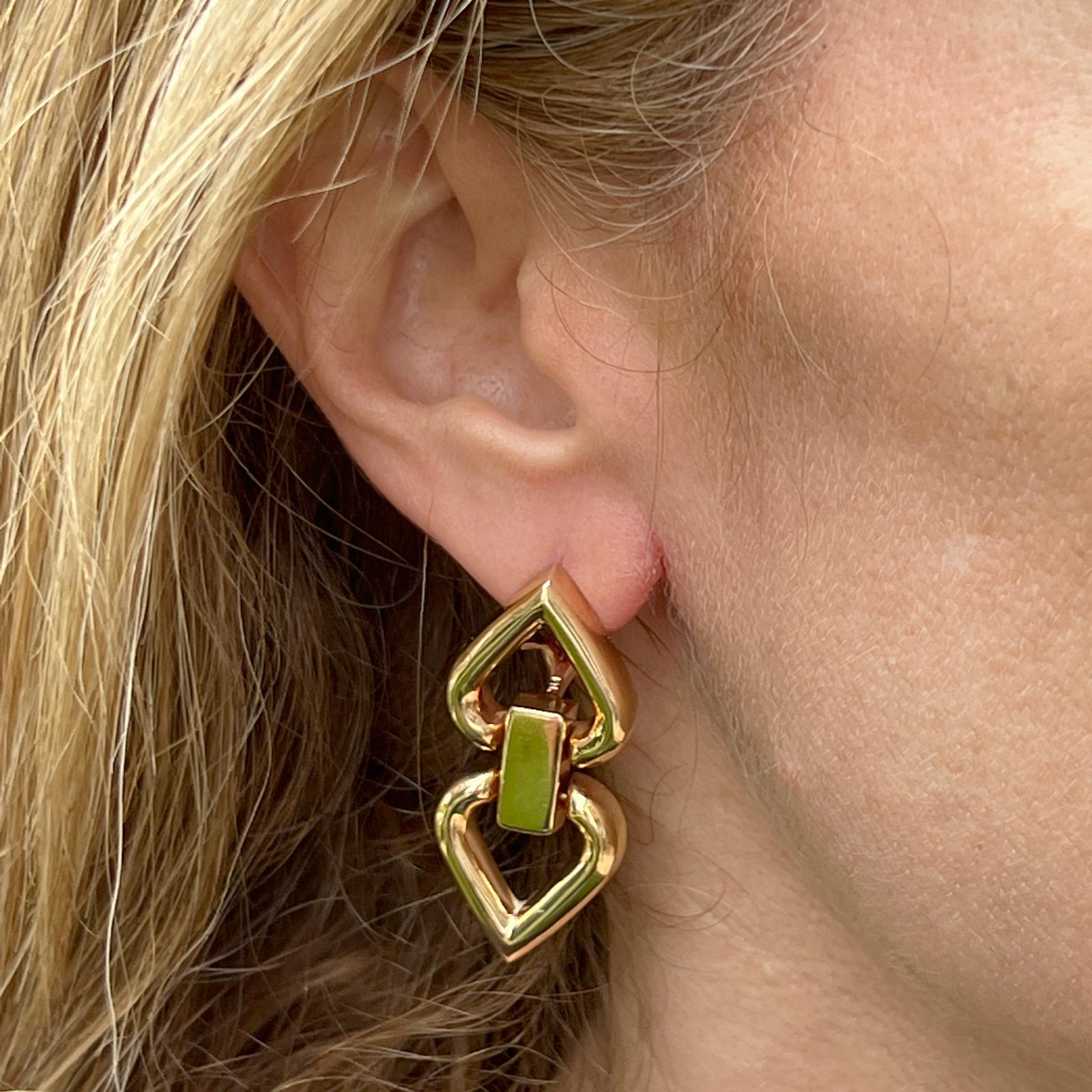 Great everyday door knocker earrings fashioned in 14 karat yellow gold. The spade shape drop earrings feature leverbacks, and measure 1.60 x .75 inches. 