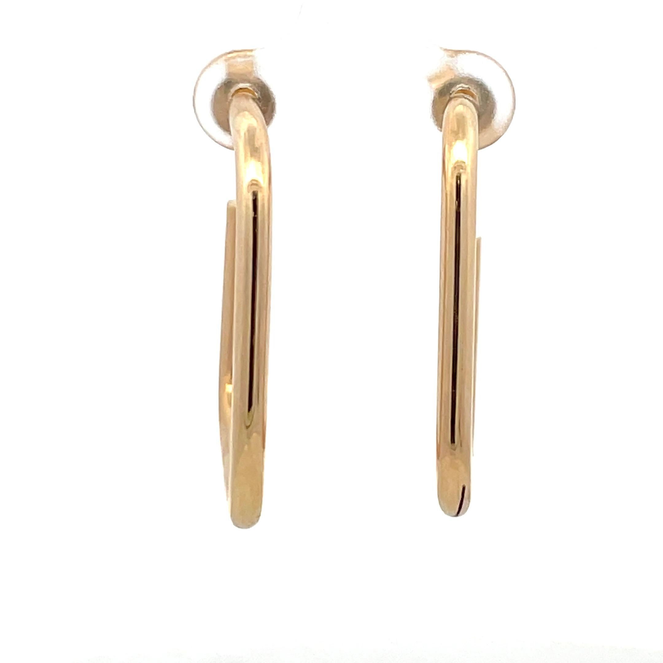 14 Karat Yellow Gold hoop earrings in a square motif weighing 5 grams and a diameter of 1.25 inches. 
