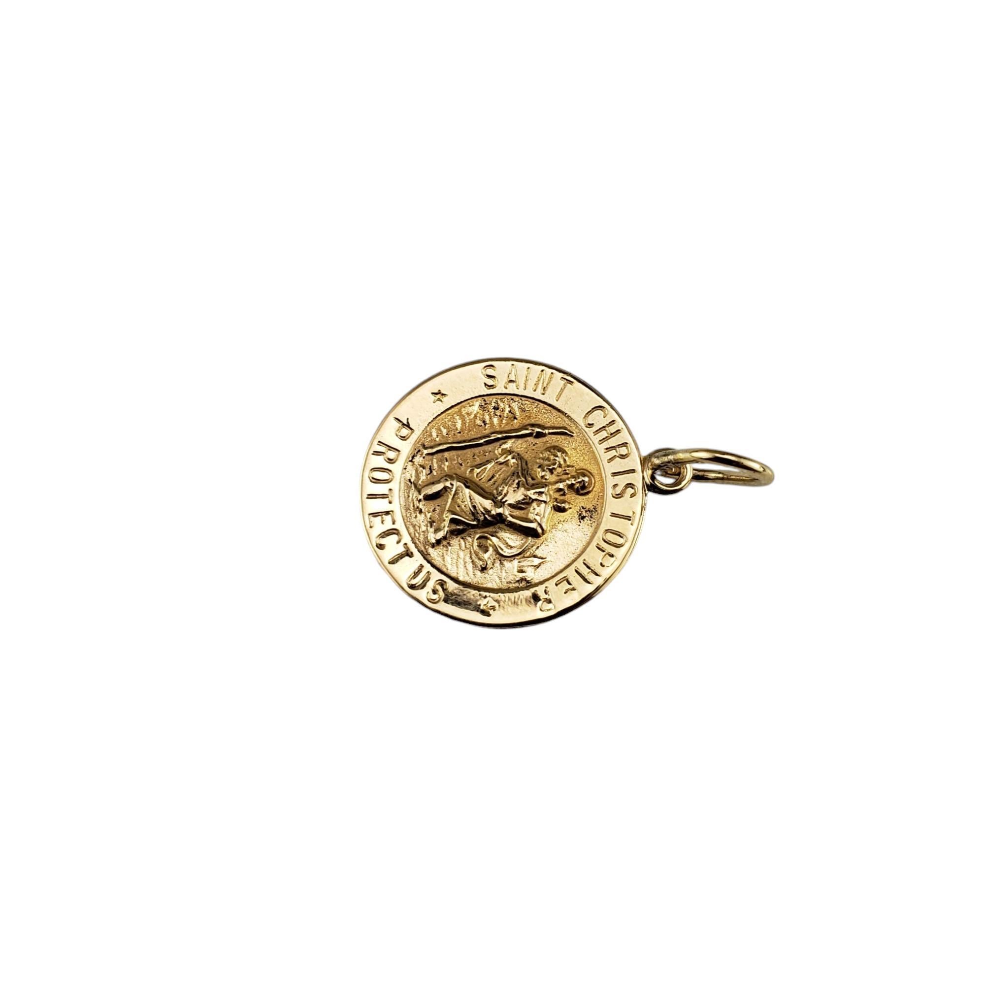 14 Karat Yellow Gold St. Christopher Medal-

This lovely St. Christopher medal is meticulously crafted in 14K yellow gold.

Stamped: 14K

Size: 16 mm x 14 mm (excluding bale)

Weight: 0.7 dwt. / 1.1 gr.

*Chain not included.

Very good condition,