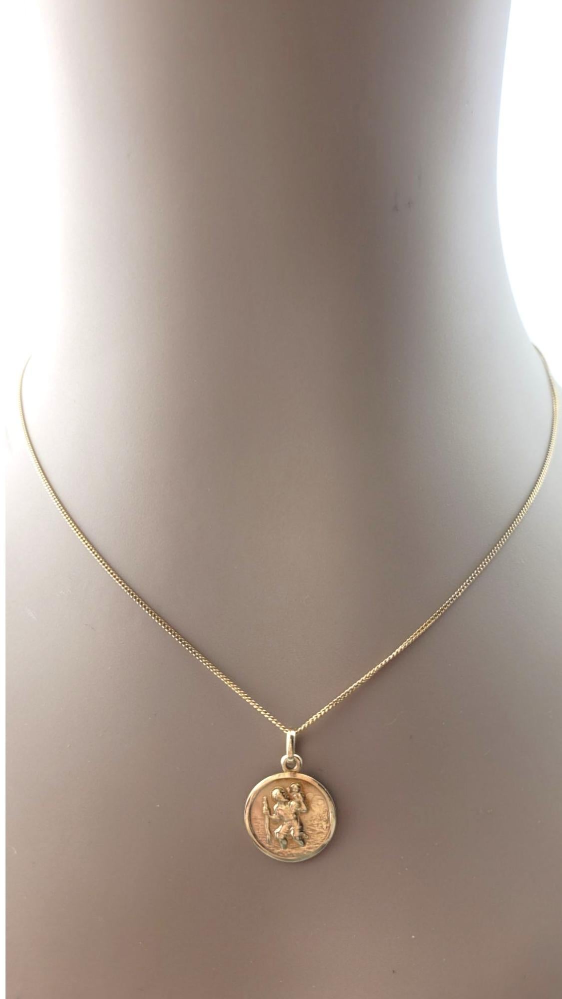 14 Karat Yellow Gold St. Christopher  Pendant-

Hallmark: 30 *207 VA 585

Weight: 1.7 g / 1.1 dwt.

Size: 18.0 mm X 15.0 mm X 0.9 mm

Length With Bale: 22.0 mm

*Chain not included.

Very good condition, professionally polished.

Will come packaged