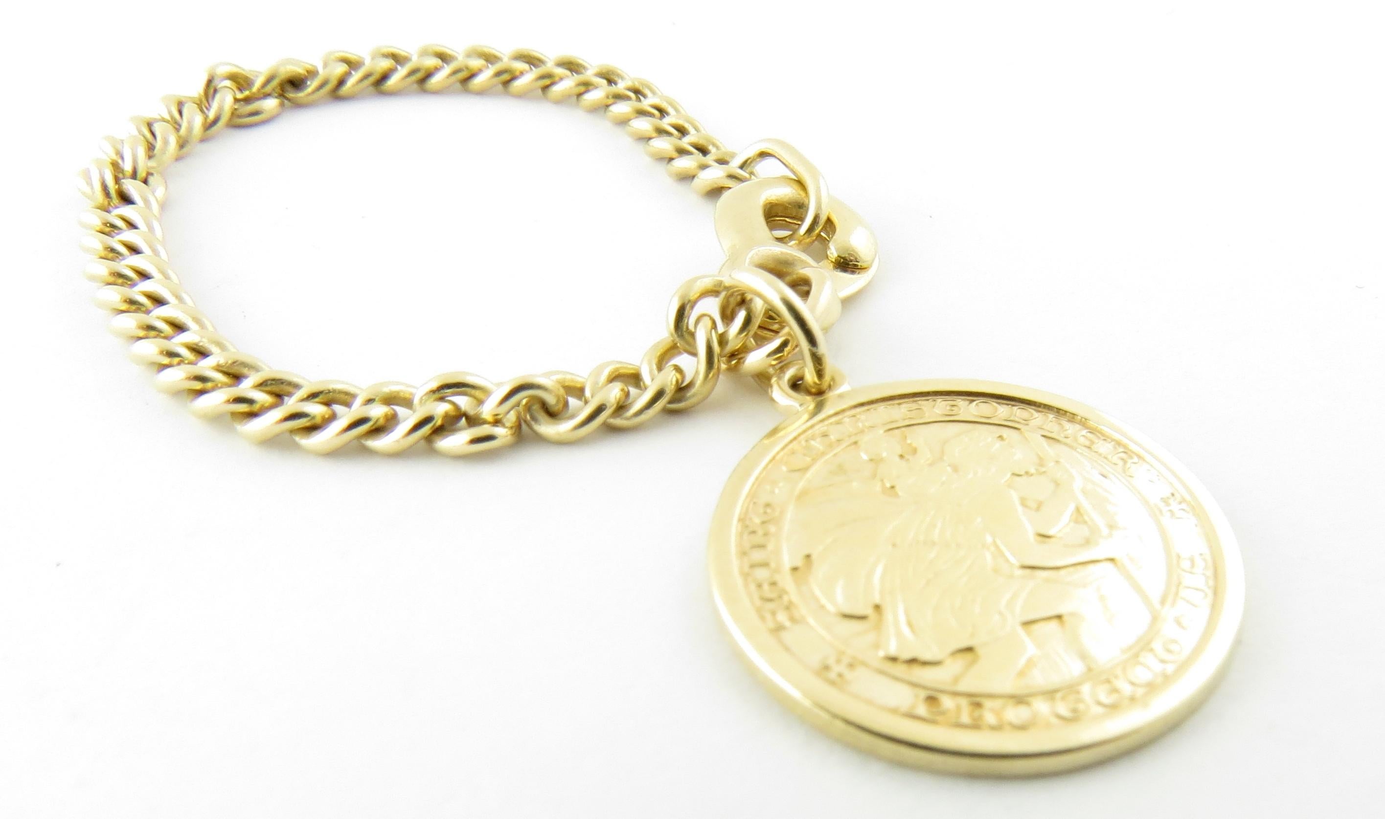 Vintage 14 Karat Yellow Gold. St. Christopher Watch Fob

This elegant watch fob features a beautifully detailed St. Christopher medal crafted in classic 14K yellow gold.

Size: 19 mm (medal) 
80 mm (chain)

Weight: 5.6 dwt. / 8.6 gr.

Stamped: