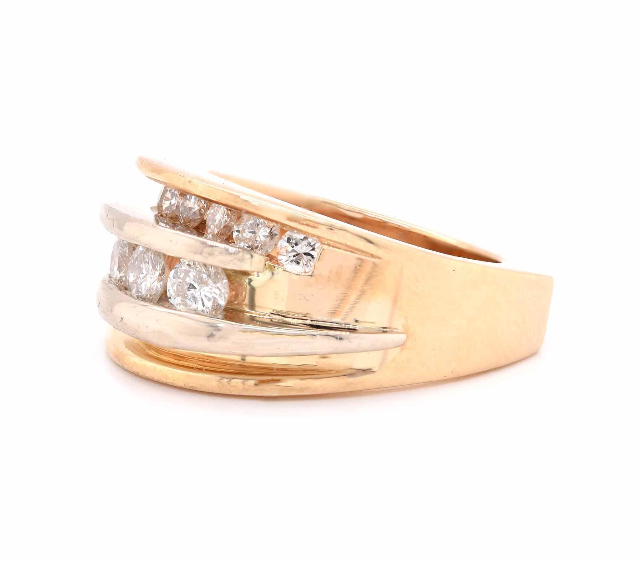 Designer: custom
Material: 14K yellow gold
Diamonds: 12 round brilliant cut = .85cttw
Color: H
Clarity: SI1
Ring size: 7 (please allow two additional shipping days for sizing requests)
Weight:  14.36 grams