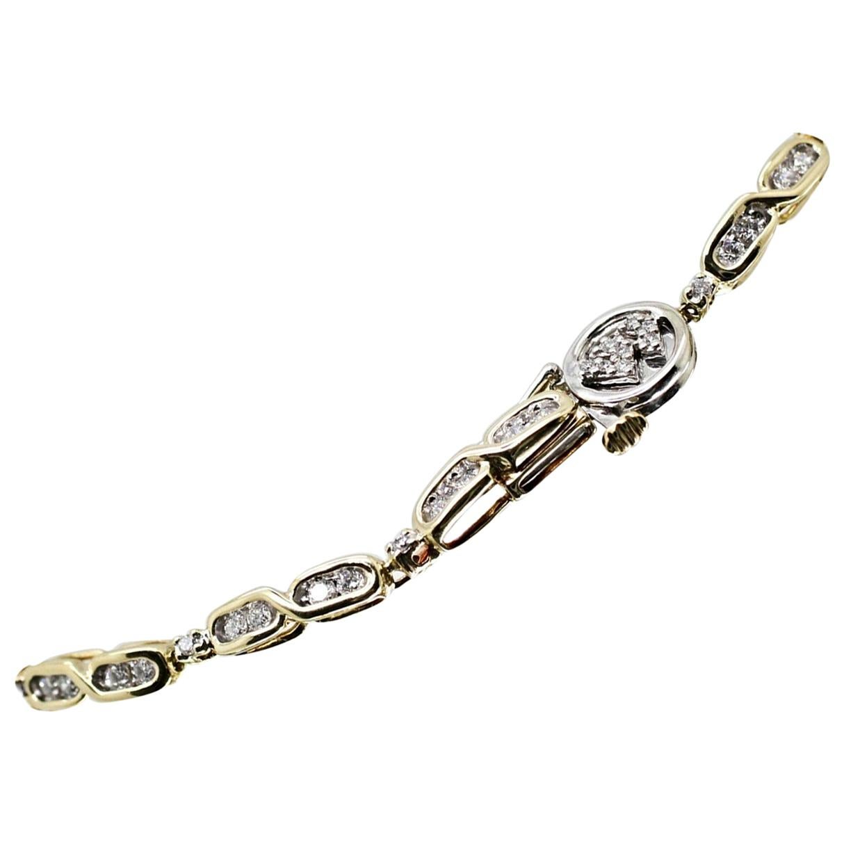 Bracelet tennis station en or jaune 14 carats avec 67 pièces de diamants taille ronde